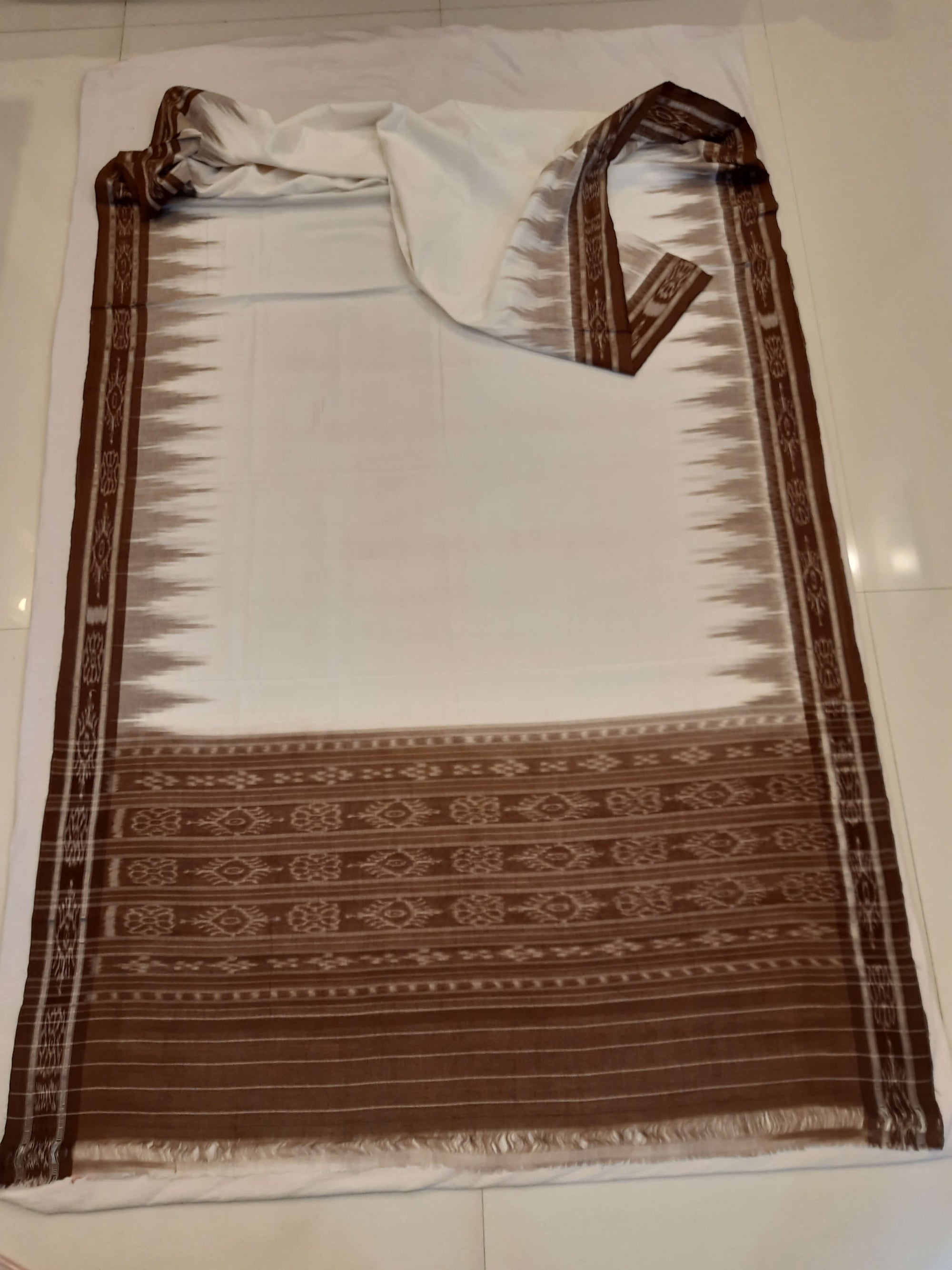 White and Brown coloured Odisha Ikat saree  with cotton ikat blouse piece