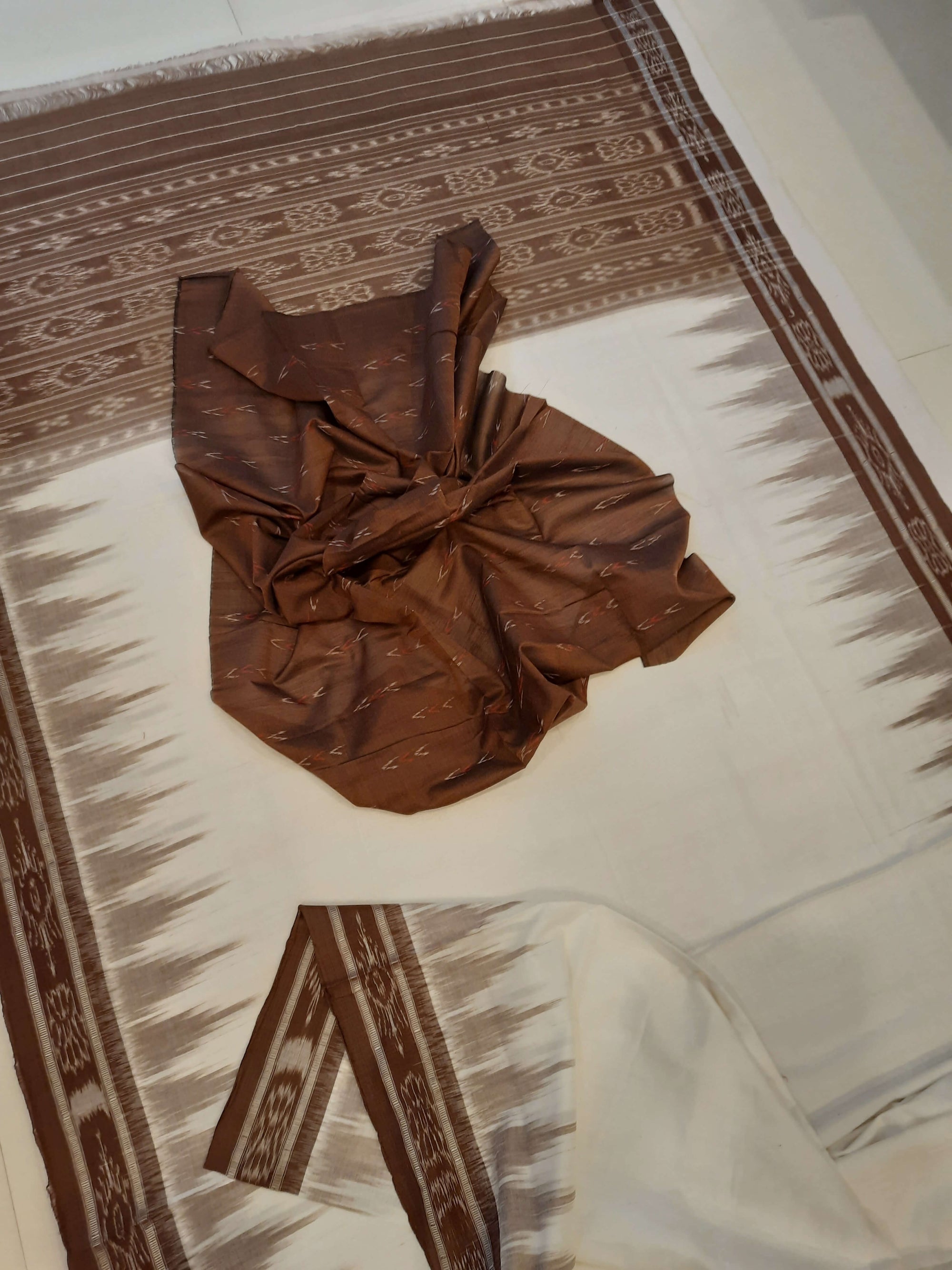 White and Brown coloured Odisha Ikat saree  with cotton ikat blouse piece