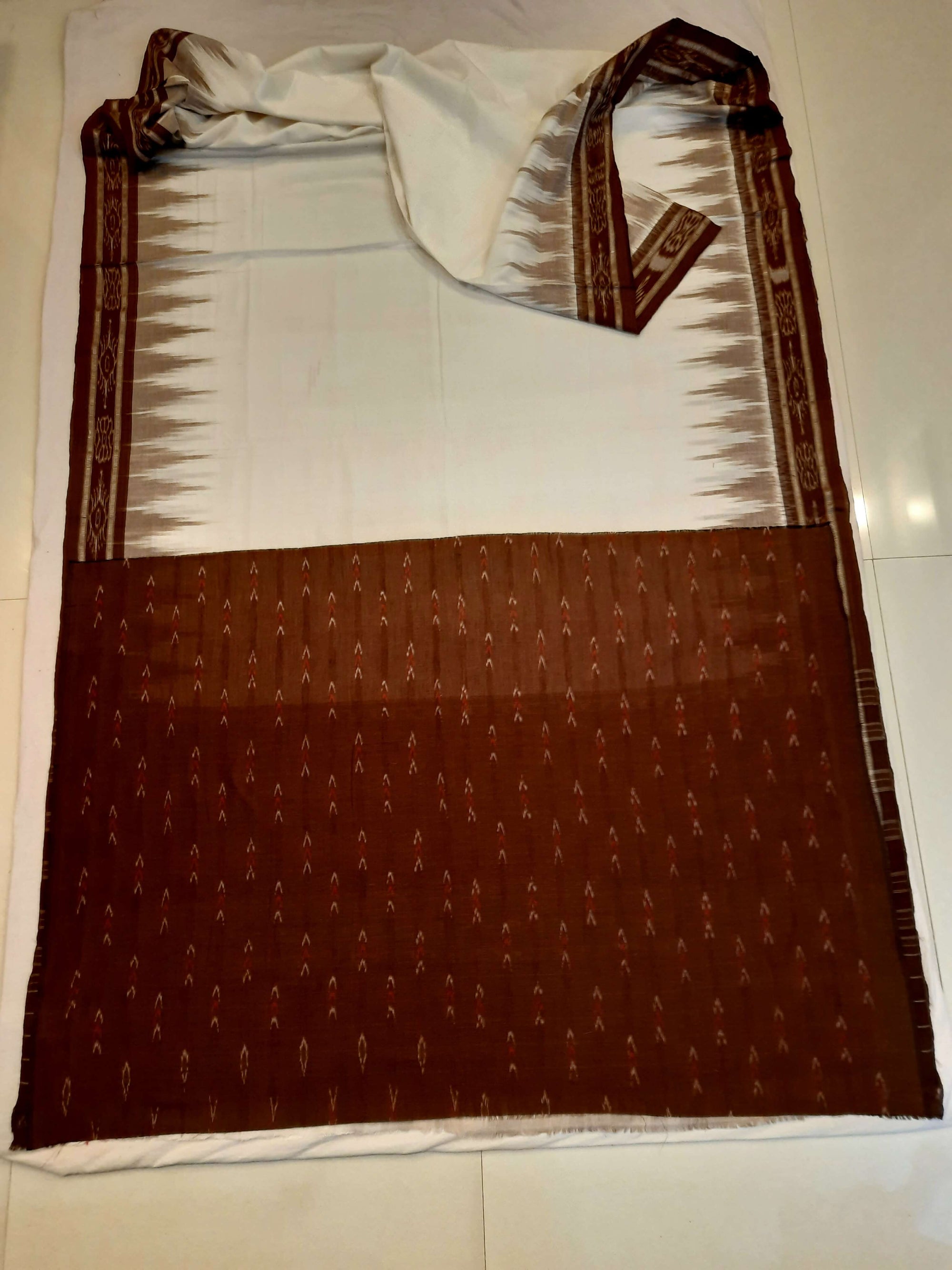White and Brown coloured Odisha Ikat saree  with cotton ikat blouse piece