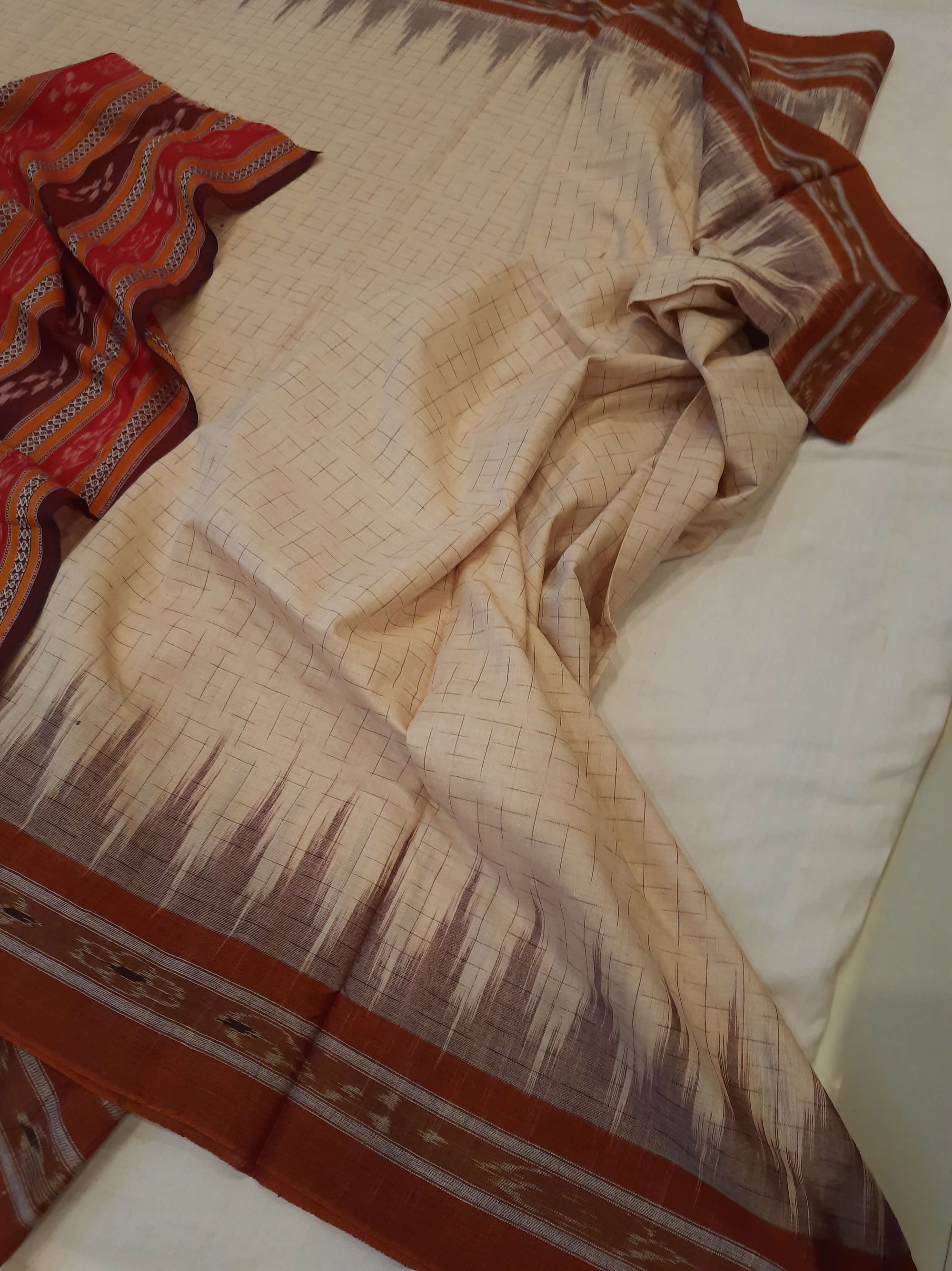 Beige and Rust Cotton Odisha Ikat saree with mix match cotton blouse piece