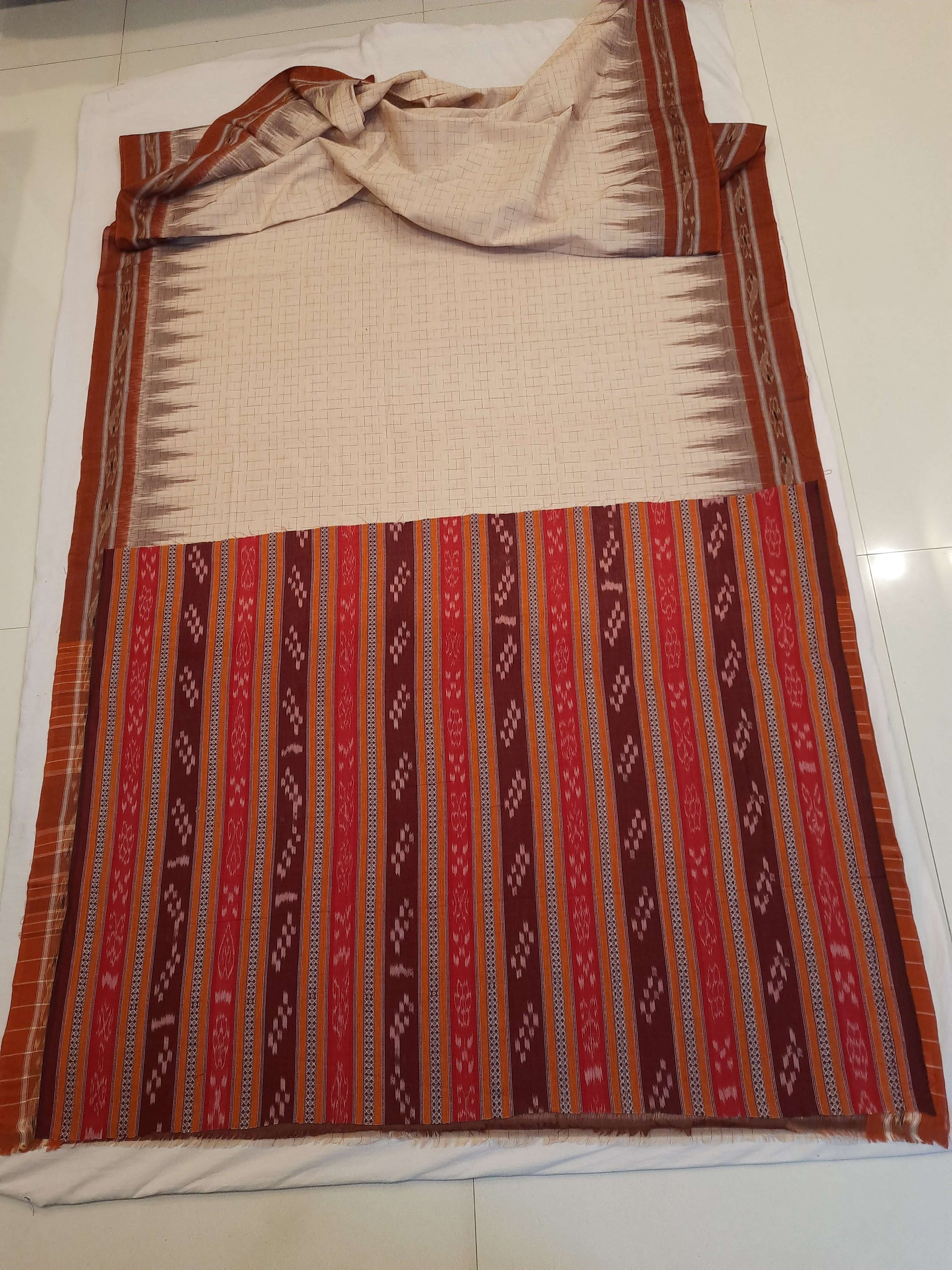 Beige and Rust Cotton Odisha Ikat saree with mix match cotton blouse piece
