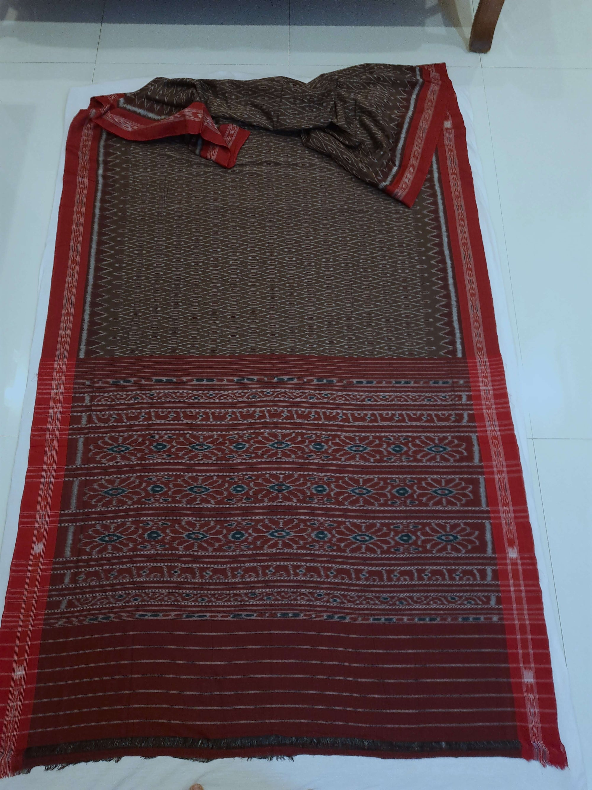 Brown Cotton Odisha Ikat saree with cotton ikat blouse piece
