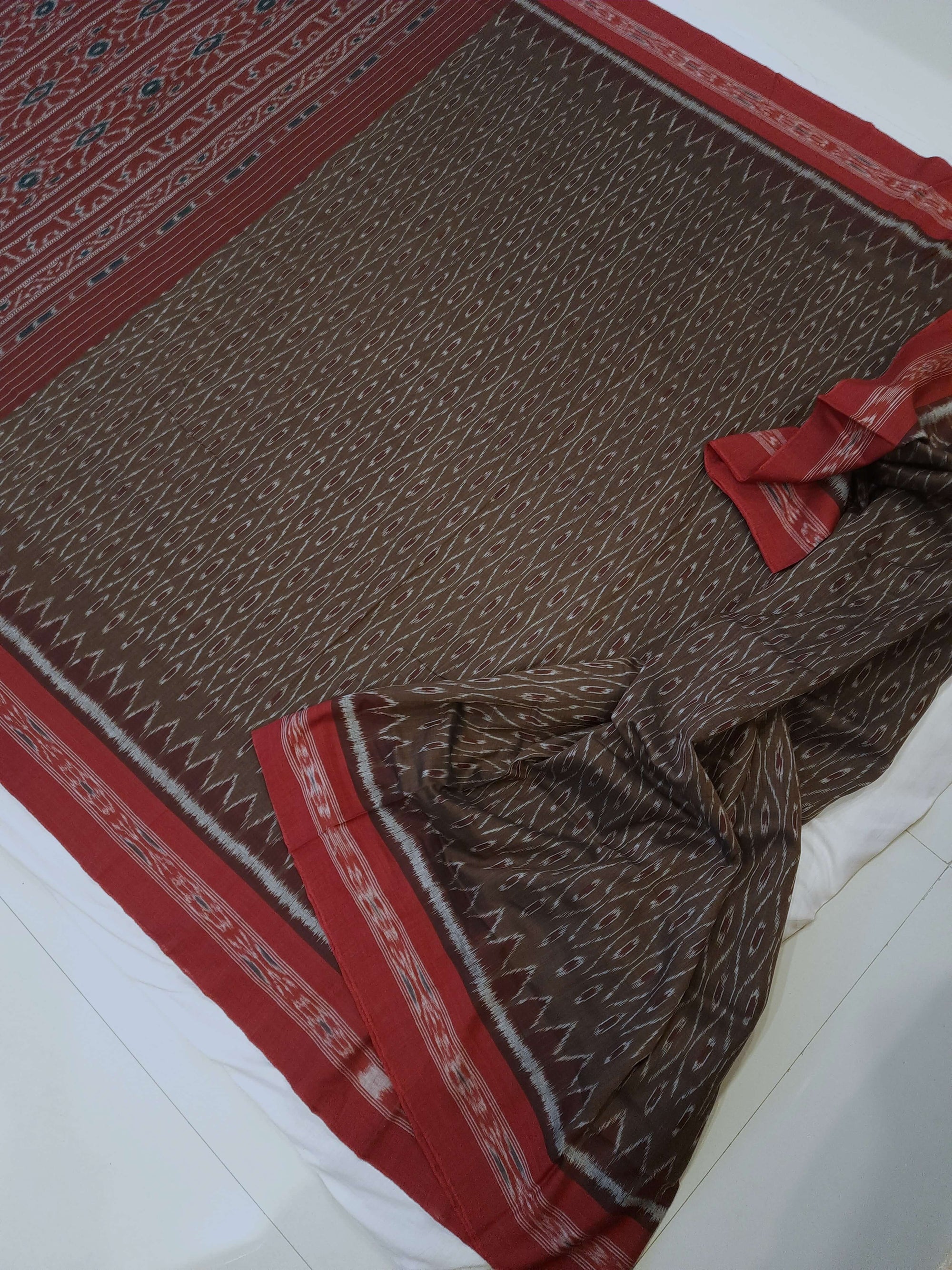 Brown Cotton Odisha Ikat saree with cotton ikat blouse piece
