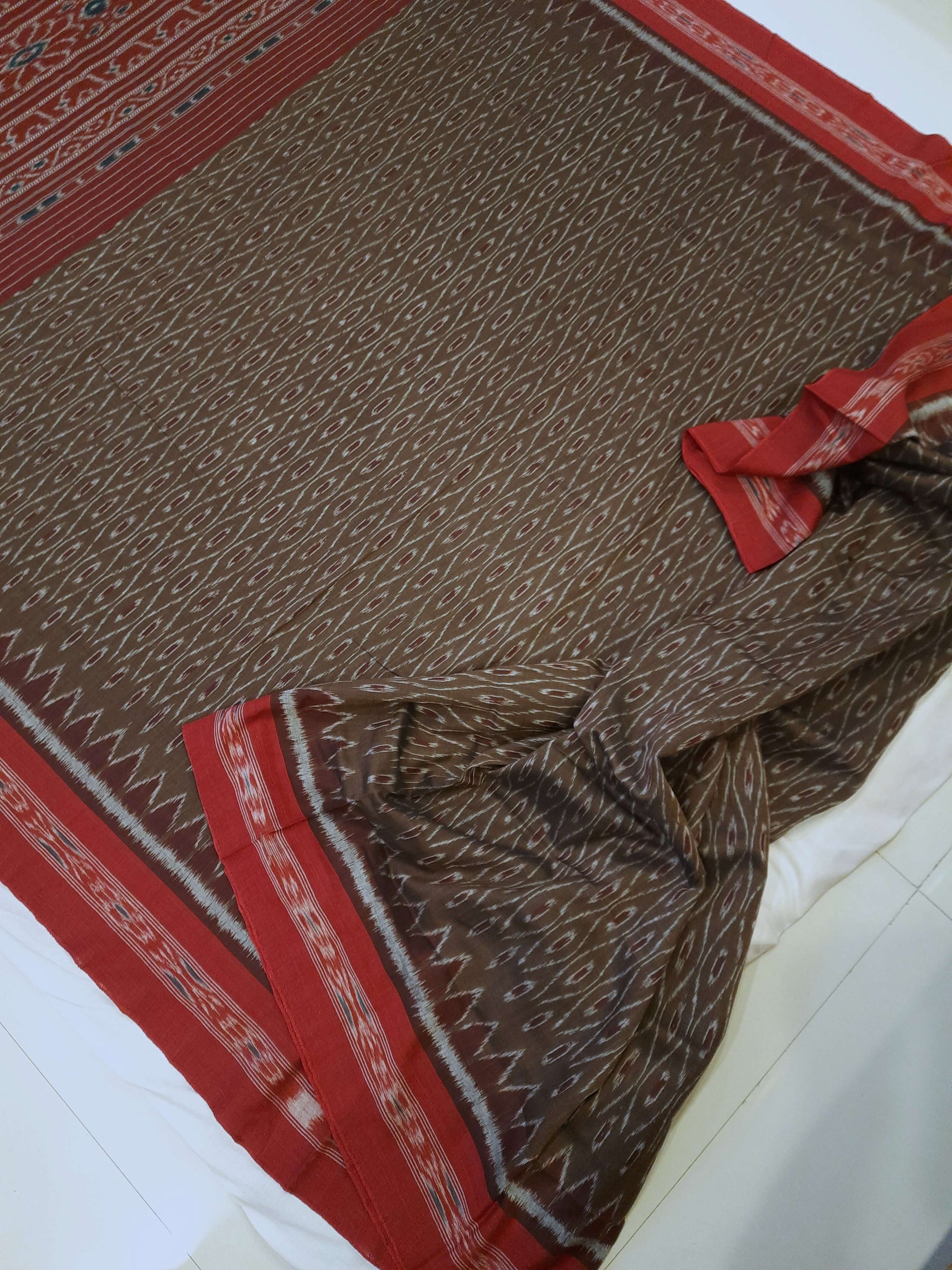 Brown Cotton Odisha Ikat saree with cotton ikat blouse piece