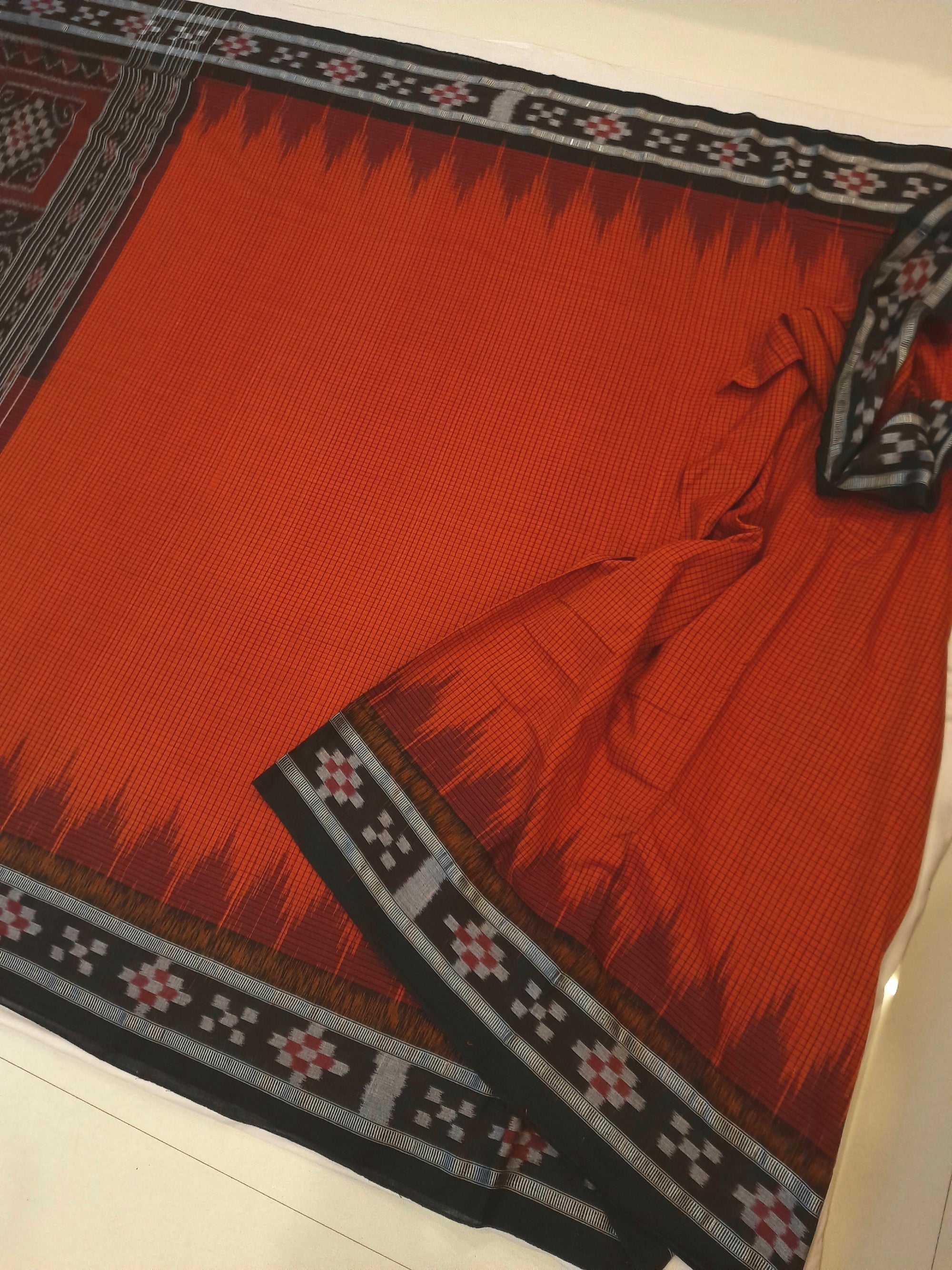 Orange checkered body Cotton Odisha Ikat saree with cotton ikat blouse piece