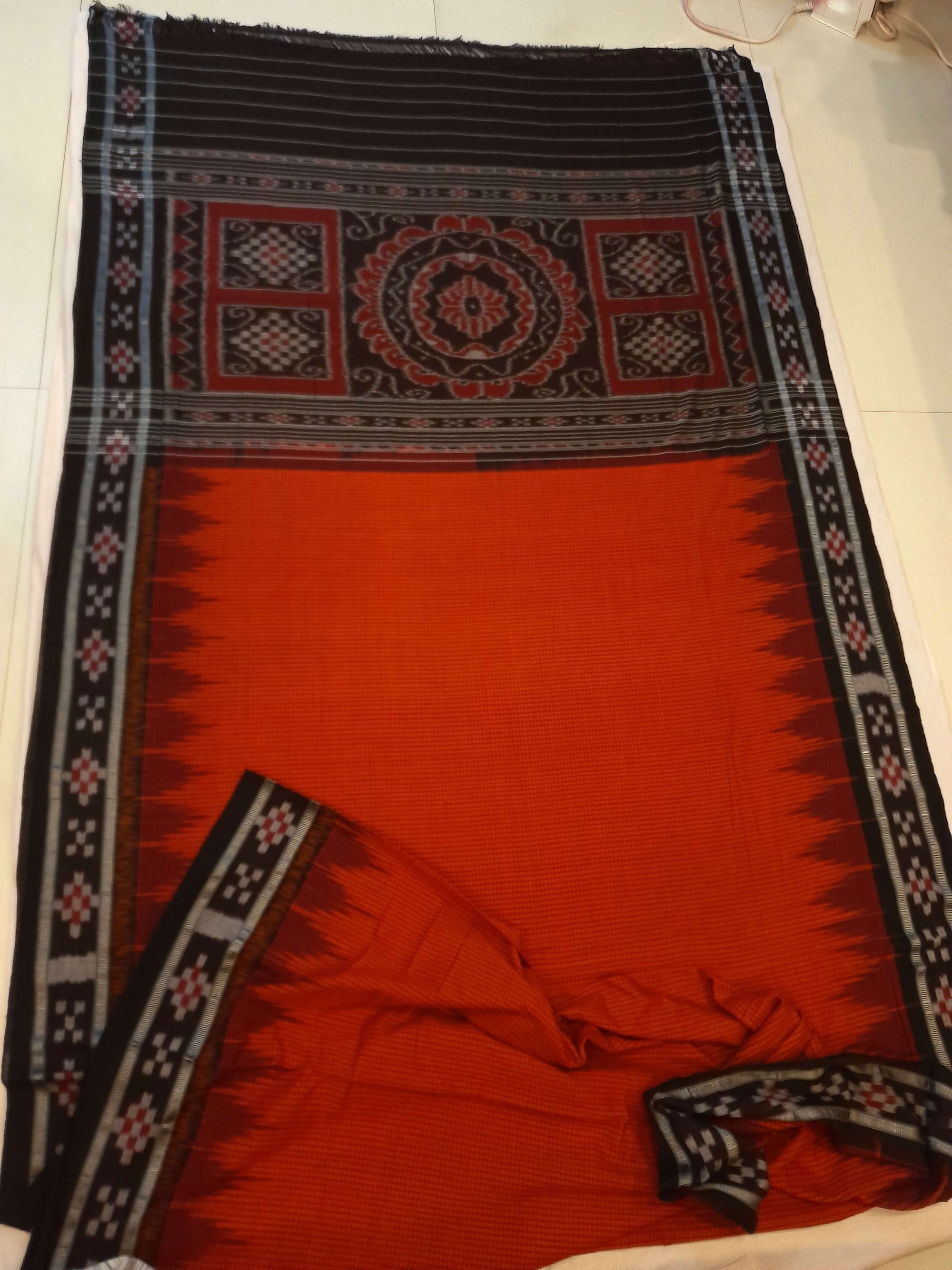 Orange checkered body Cotton Odisha Ikat saree with cotton ikat blouse piece