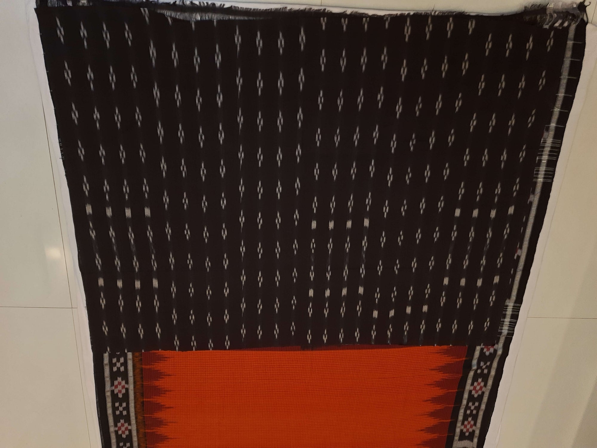 Orange checkered body Cotton Odisha Ikat saree with cotton ikat blouse piece