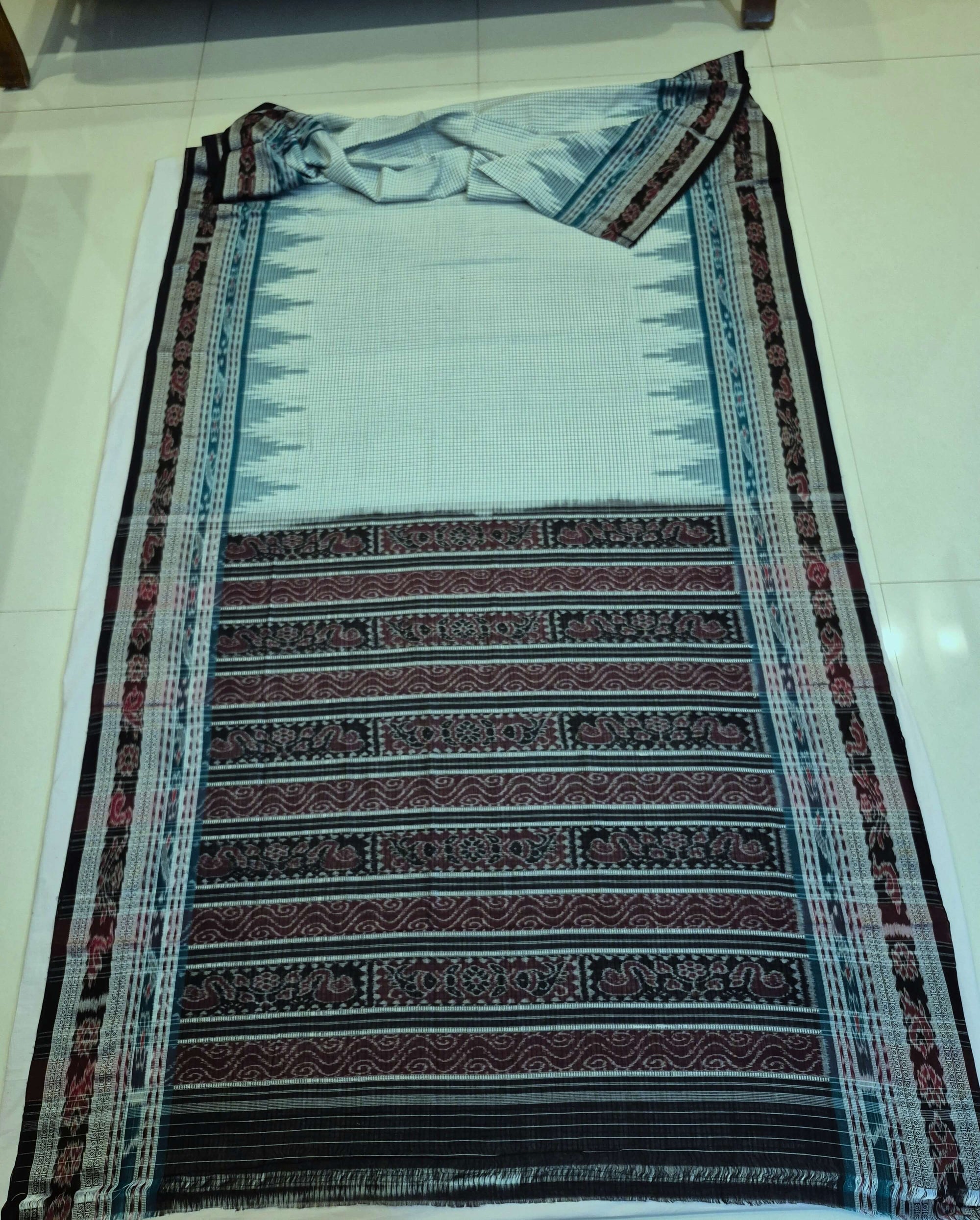 Off-white double order Sachipar Nuapatna Cotton Ikat saree with cotton ikat blouse piece