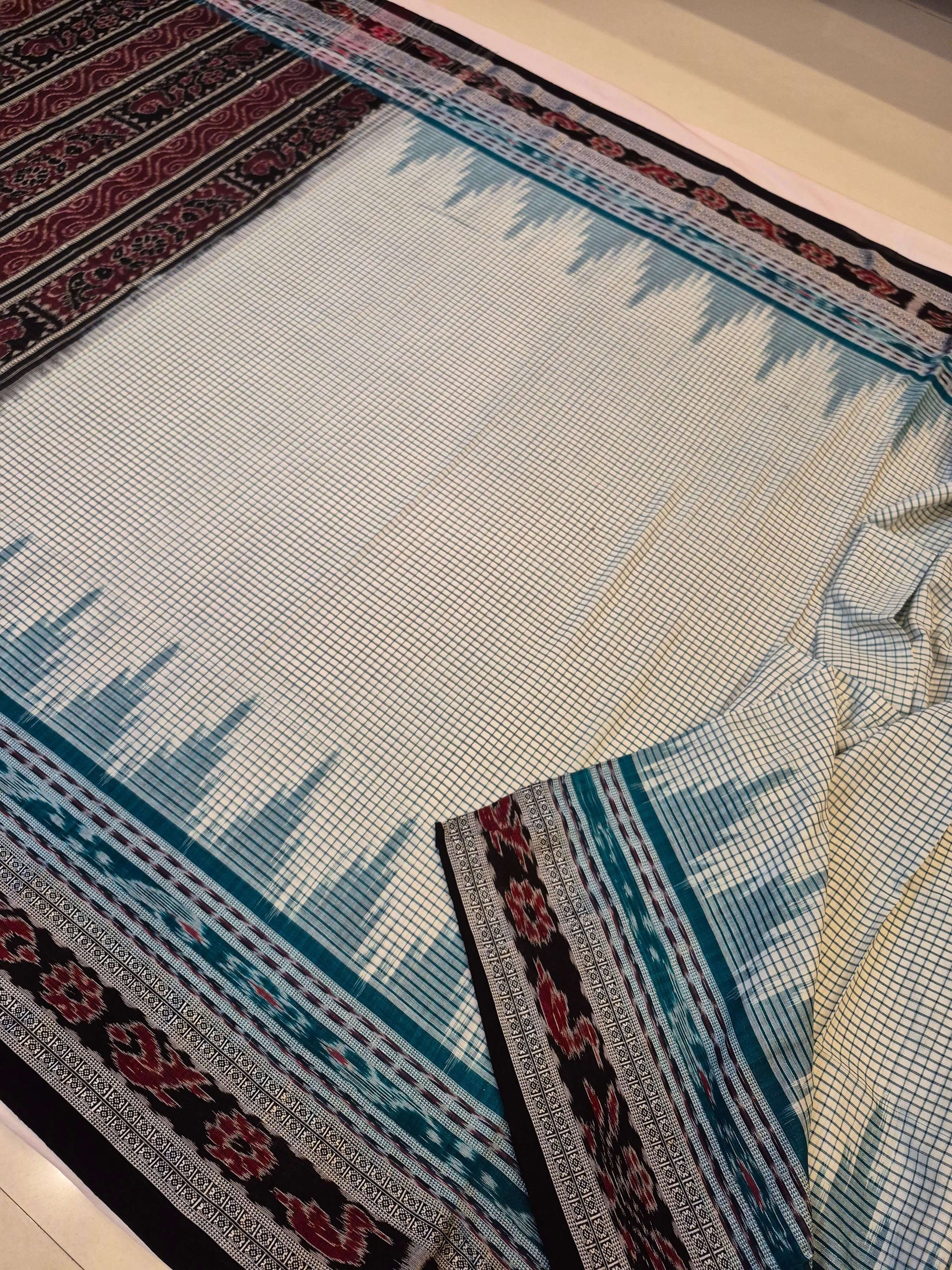 Off-white double order Sachipar Nuapatna Cotton Ikat saree with cotton ikat blouse piece
