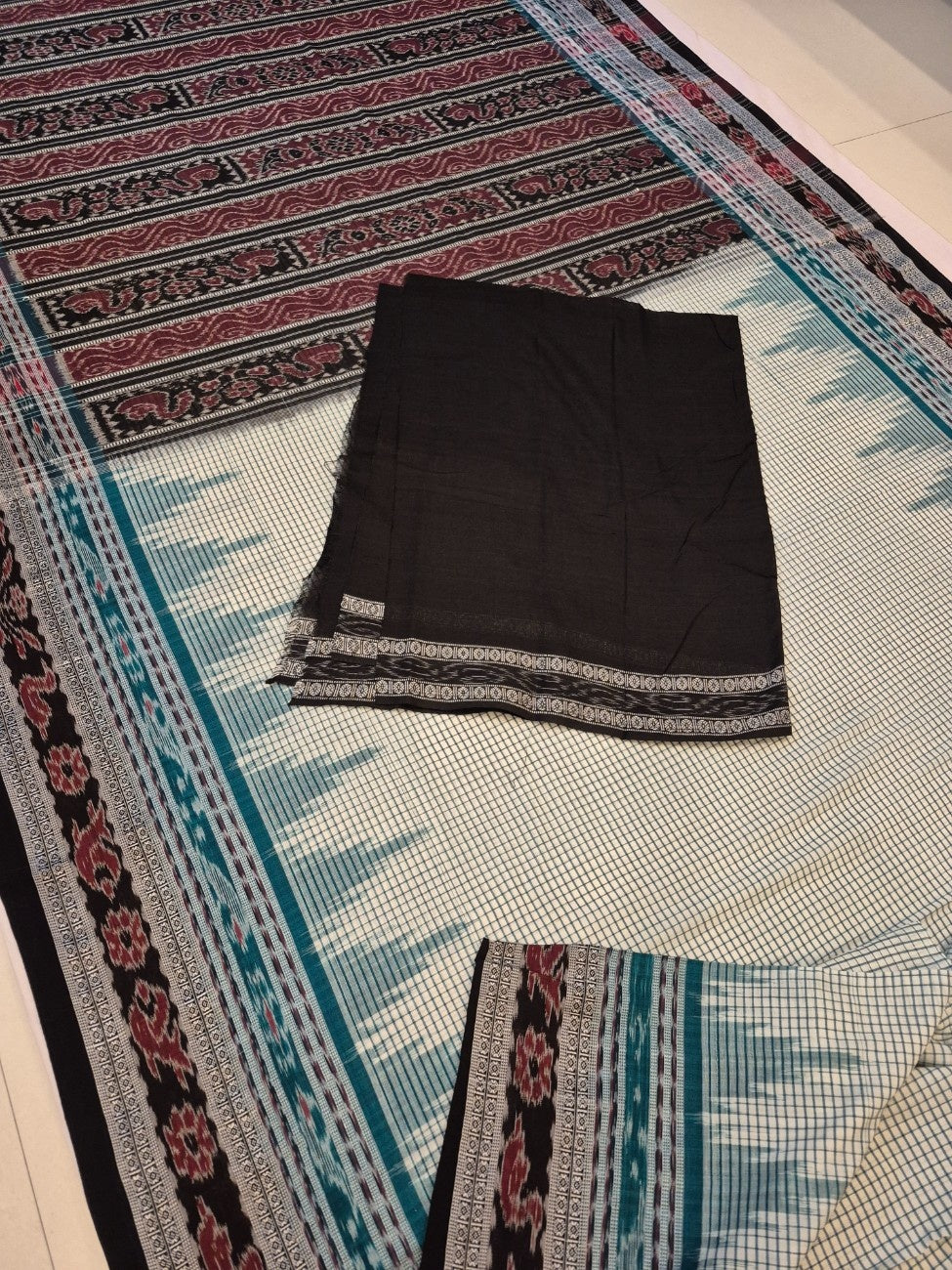Off-white double order Sachipar Nuapatna Cotton Ikat saree with cotton ikat blouse piece