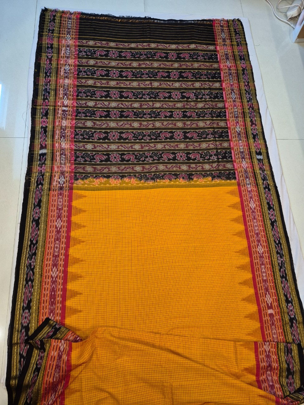 Yellow double order Sachipar Nuapatna Cotton Ikat saree with cotton ikat blouse piece