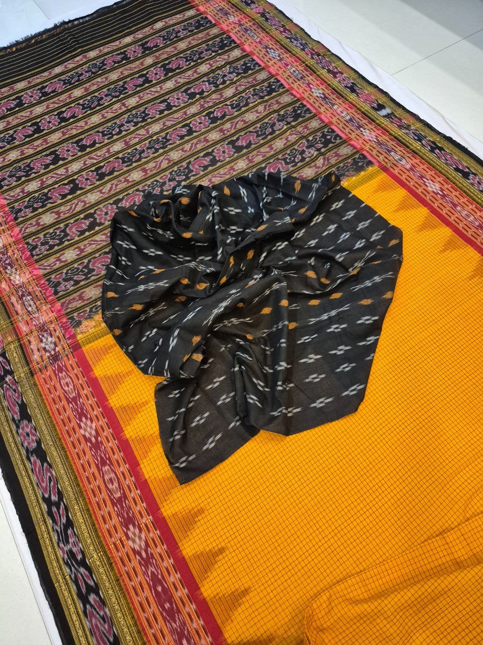 Yellow double order Sachipar Nuapatna Cotton Ikat saree with cotton ikat blouse piece