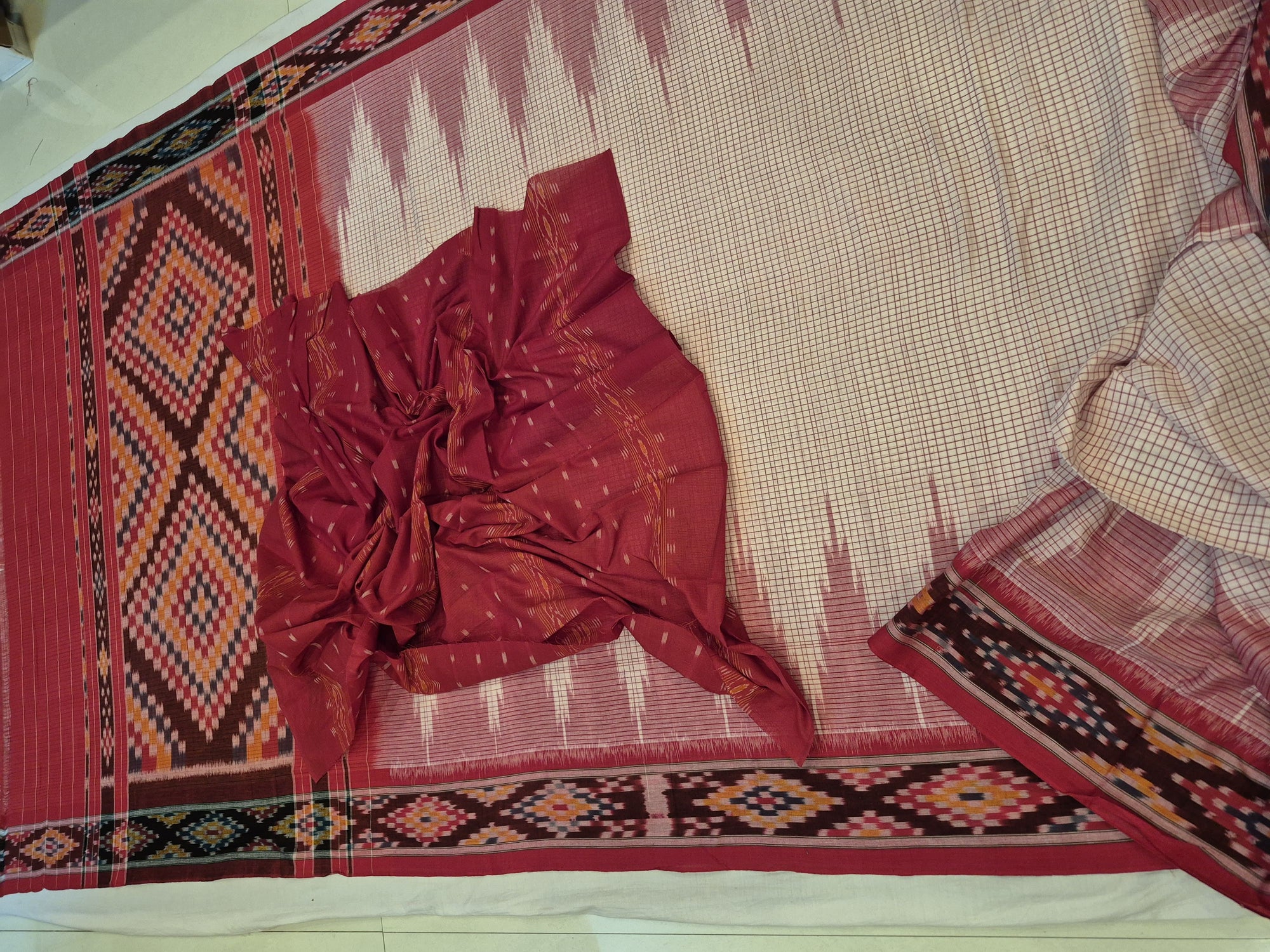 Beige Checkered body Cotton Odisha Ikat saree with cotton ikat blouse piece