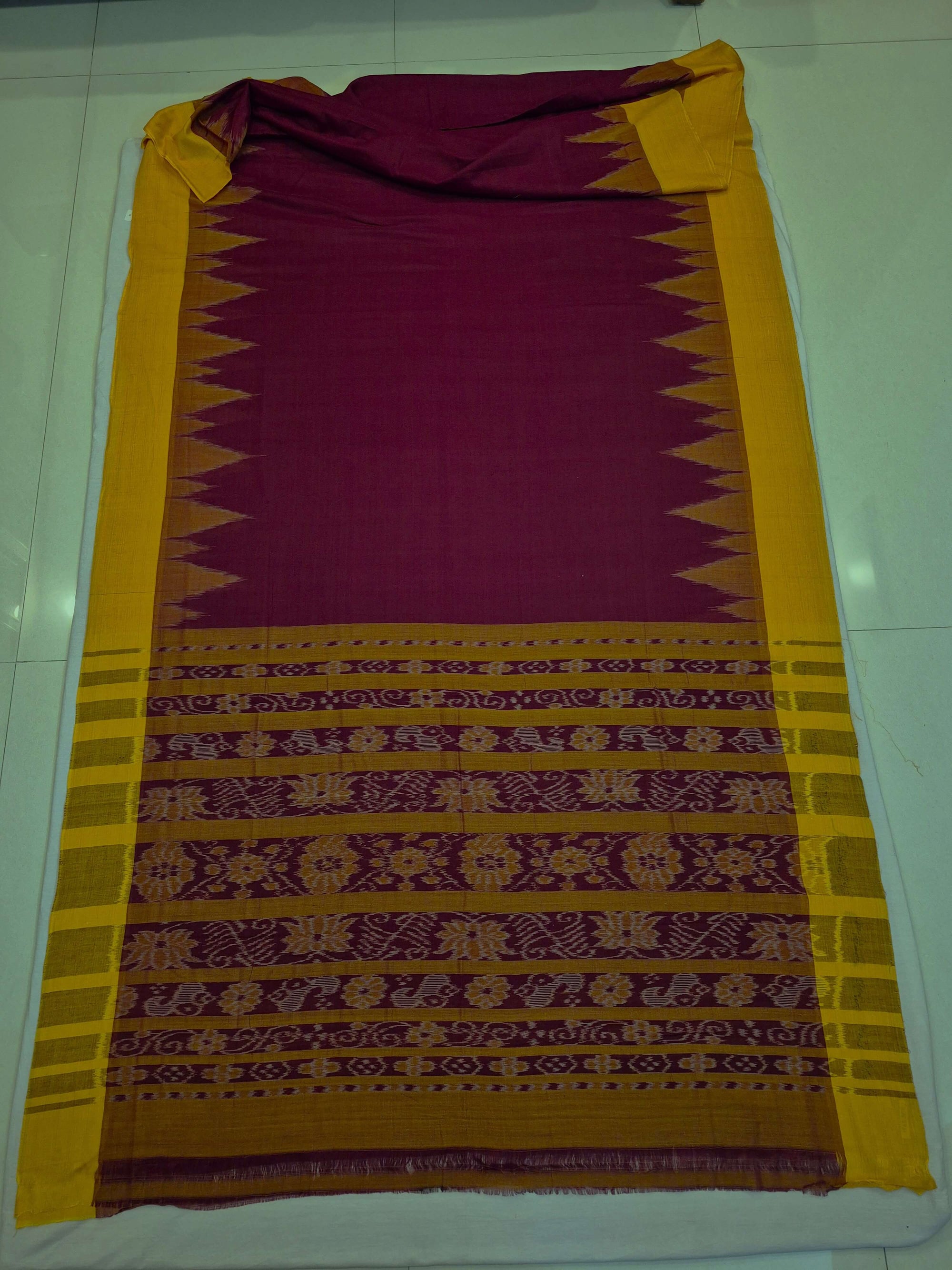 Maroon Golden Cotton Odisha Ikat saree with cotton ikat blouse piece