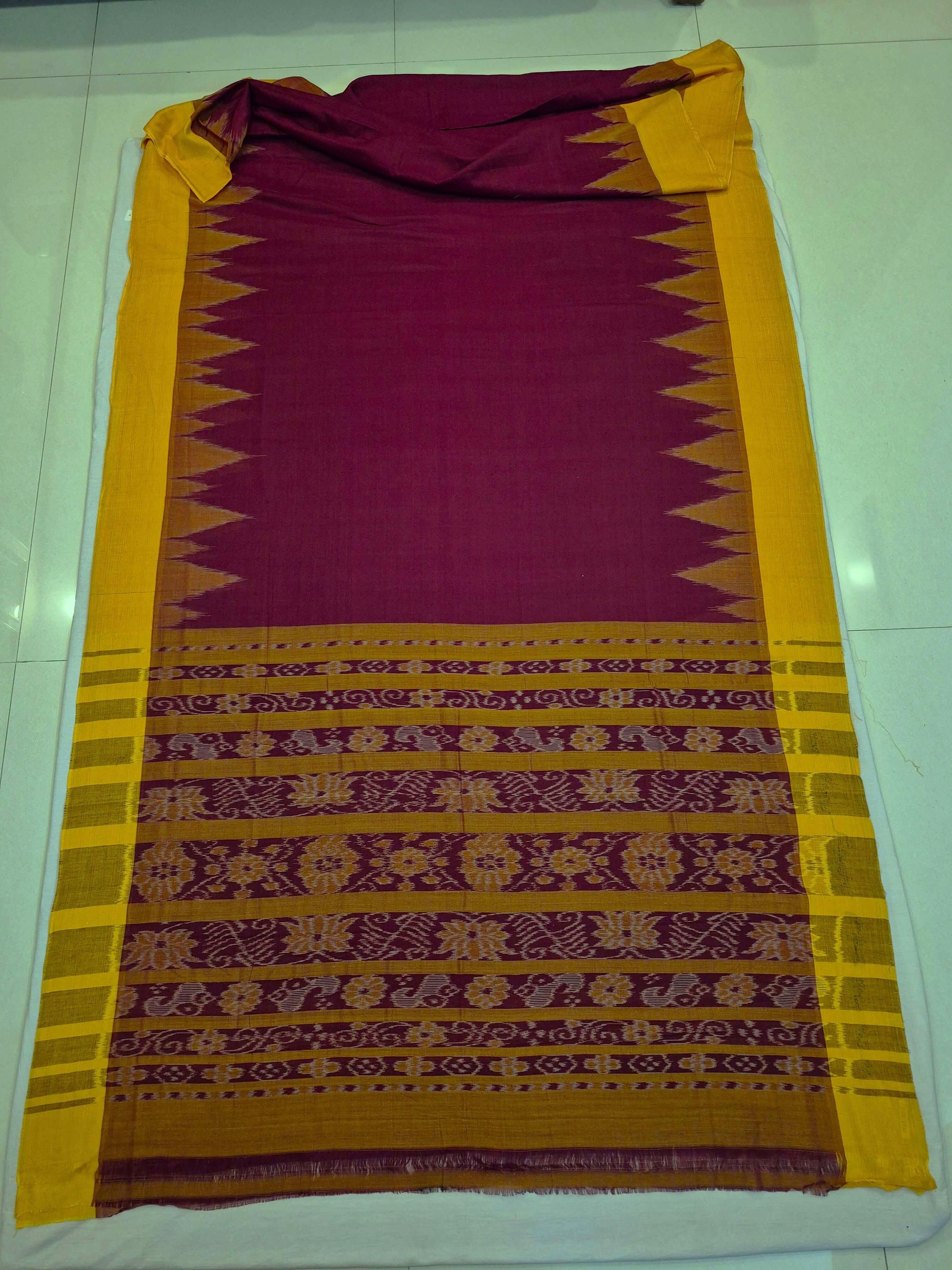 Maroon Golden Cotton Odisha Ikat saree with cotton ikat blouse piece