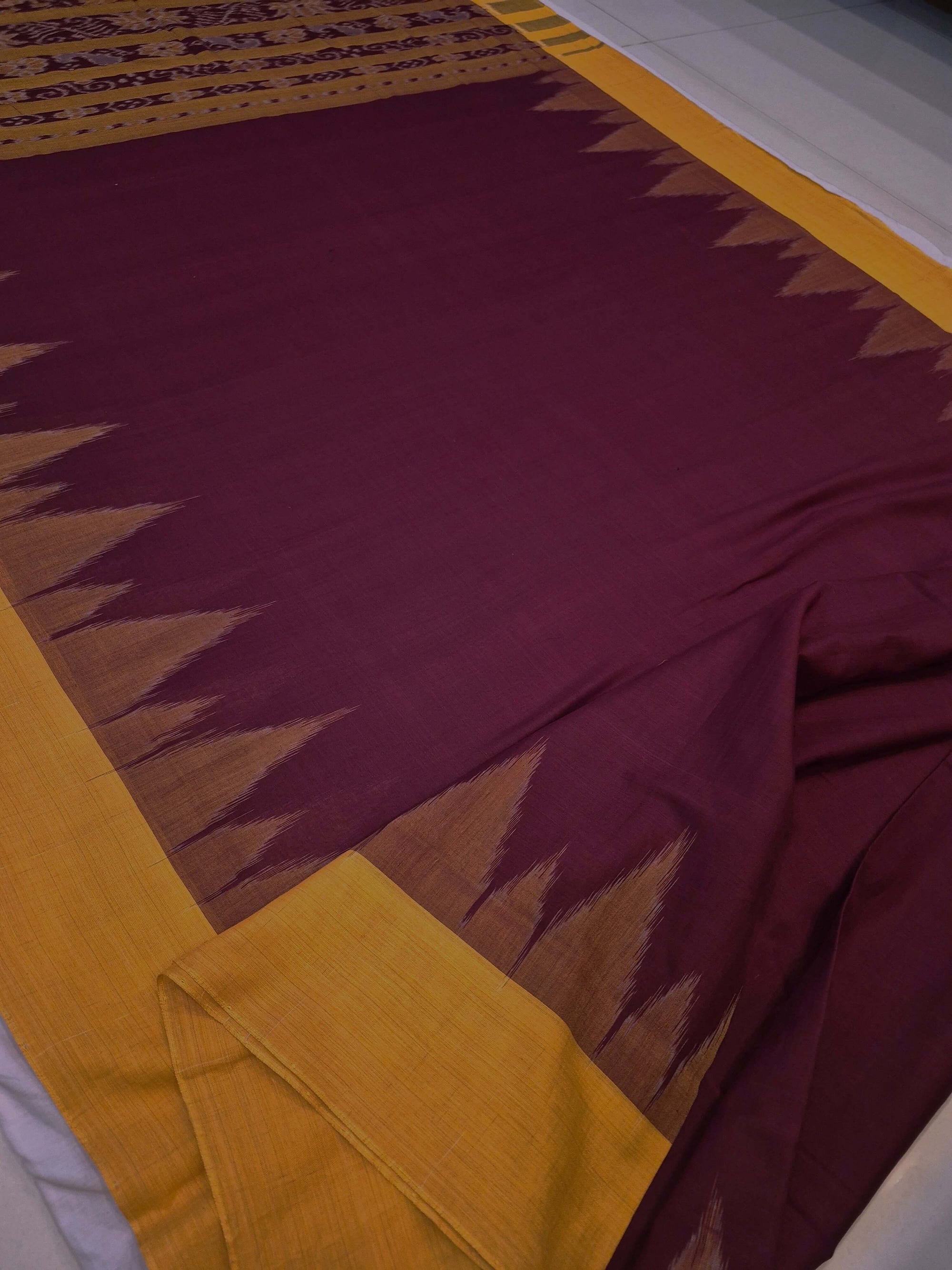 Maroon Golden Cotton Odisha Ikat saree with cotton ikat blouse piece