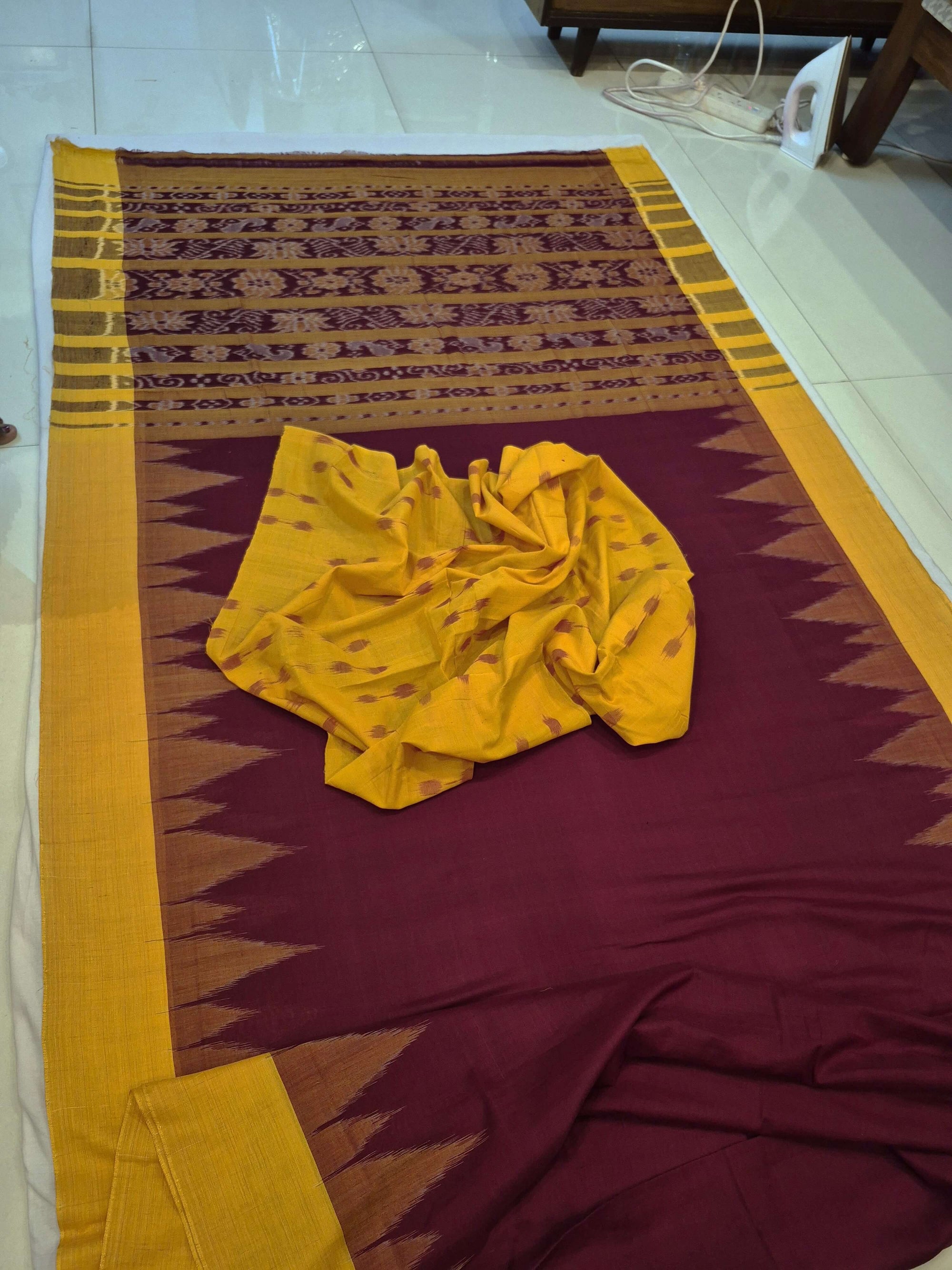 Maroon Golden Cotton Odisha Ikat saree with cotton ikat blouse piece