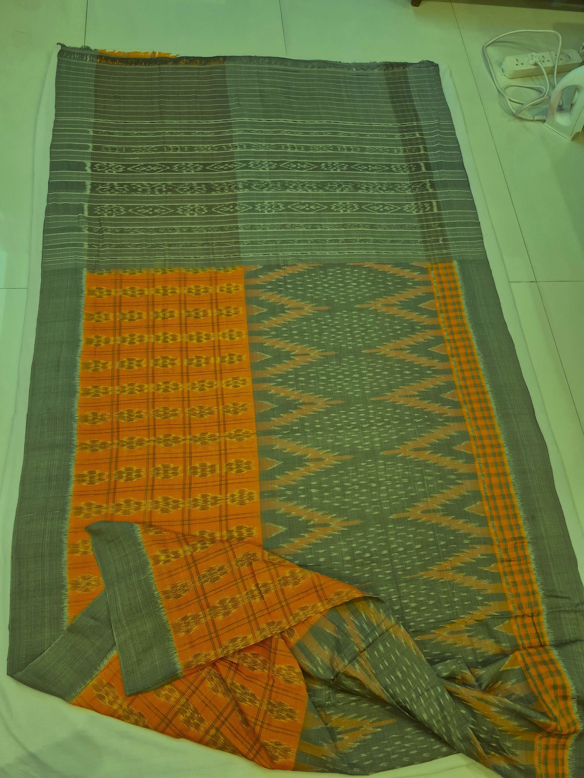Light Green Orange half half body coloured Odisha Ikat saree with cotton ikat blouse piece