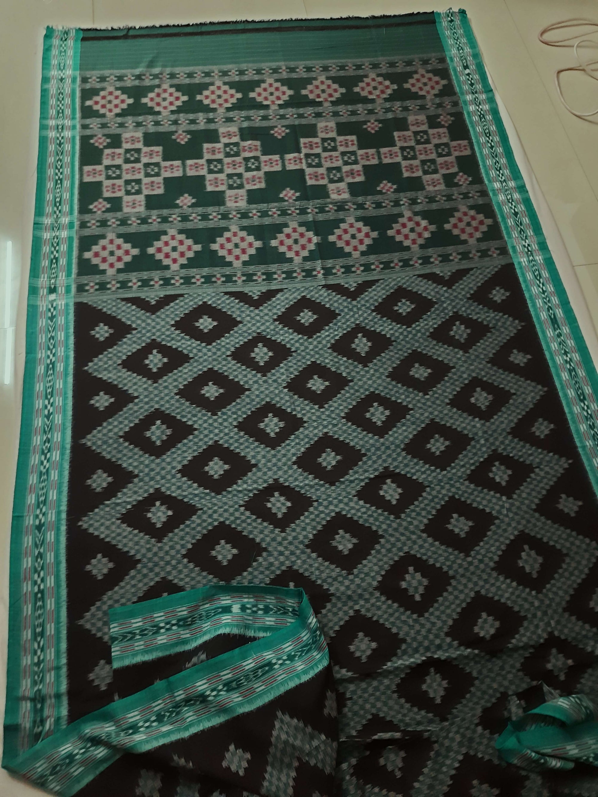 Black Cotton Tarabali Odisha Ikat saree with mix match cotton ikat blouse piece