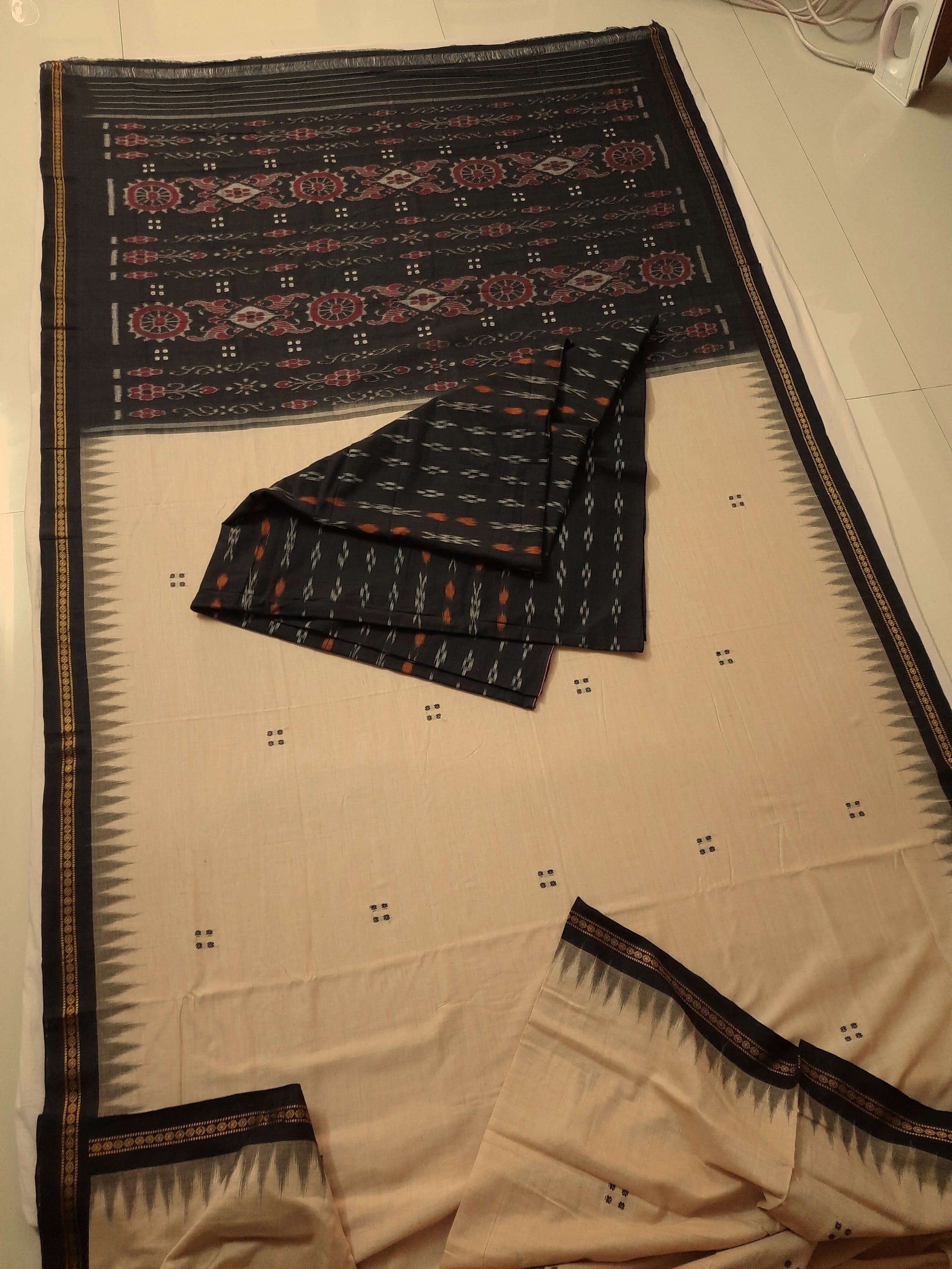 Beige with Black Cotton Odisha Ikat saree  with mix match cotton ikat blouse