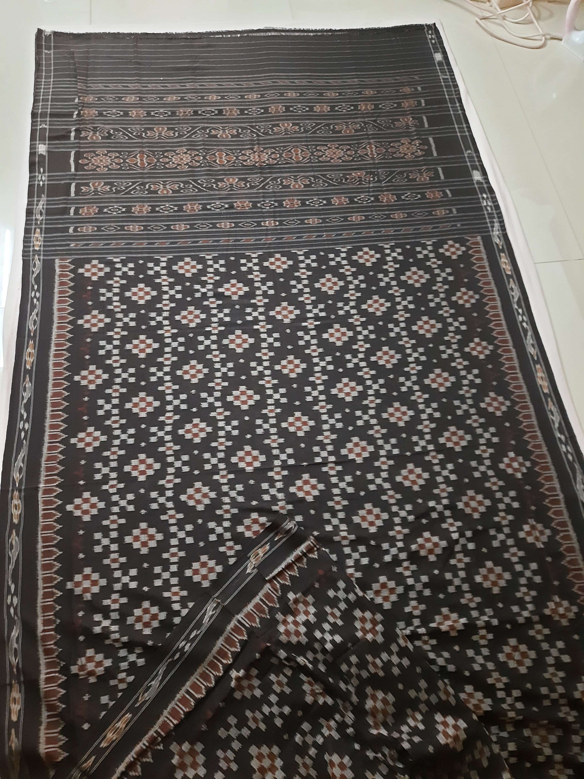 Black Cotton Ikat saree with cotton ikat blouse piece