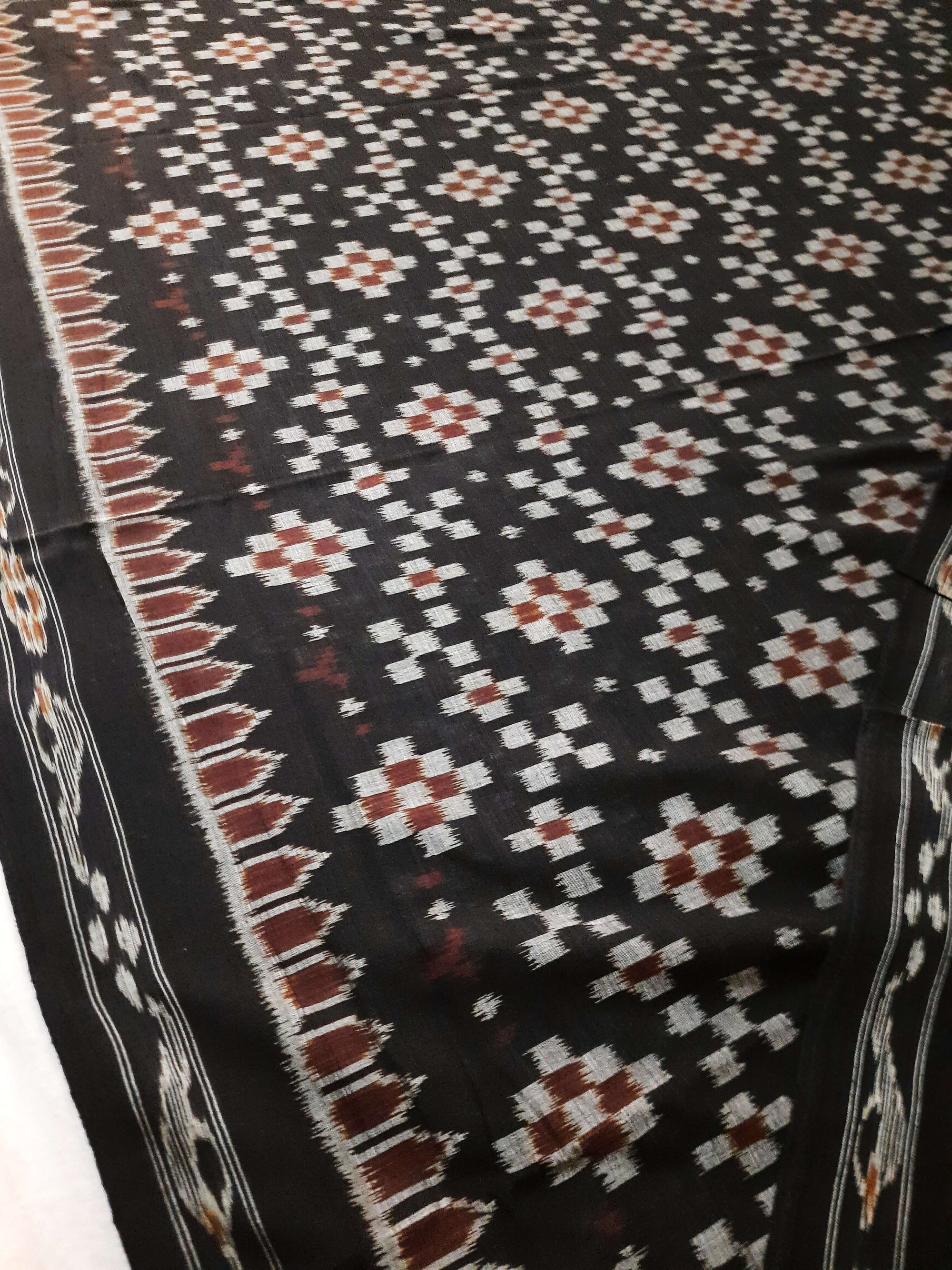 Black Cotton Ikat saree with cotton ikat blouse piece