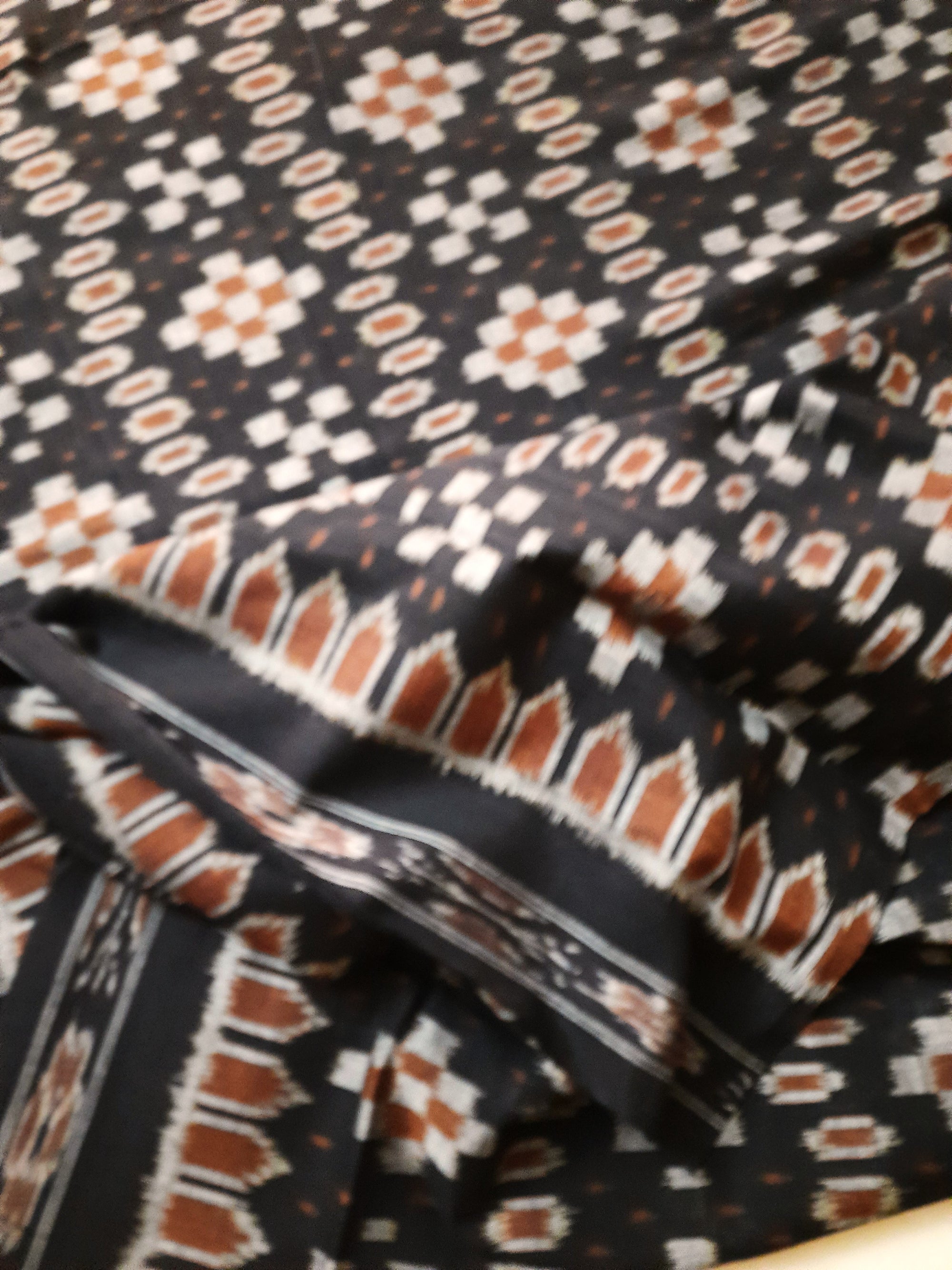 Black Cotton Ikat saree with cotton ikat blouse piece