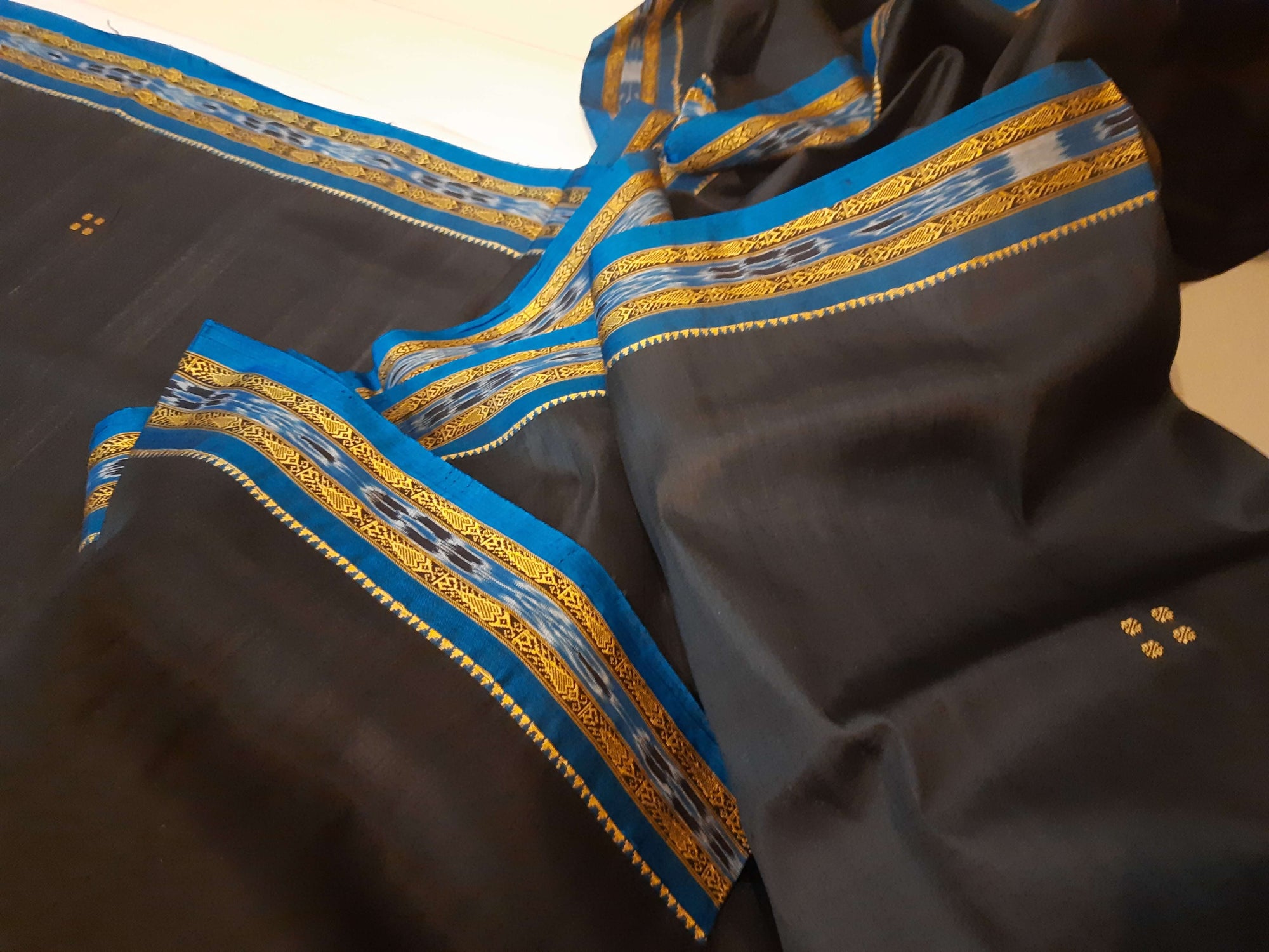 Black with Blue Fish motif Odisha Khandua Patta Silk Saree paired with cotton ikat blouse piece