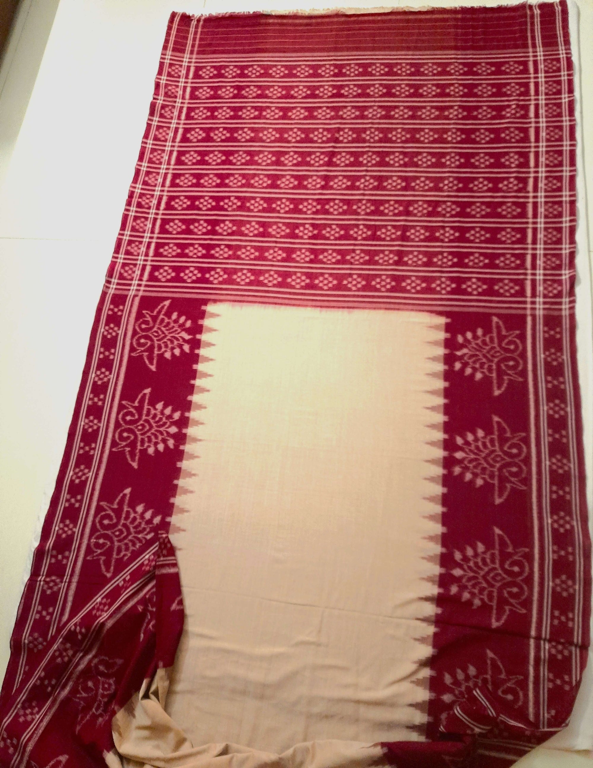 Beige and Maroon wide border Cotton Odisha Ikat saree with cotton ikat blouse piece