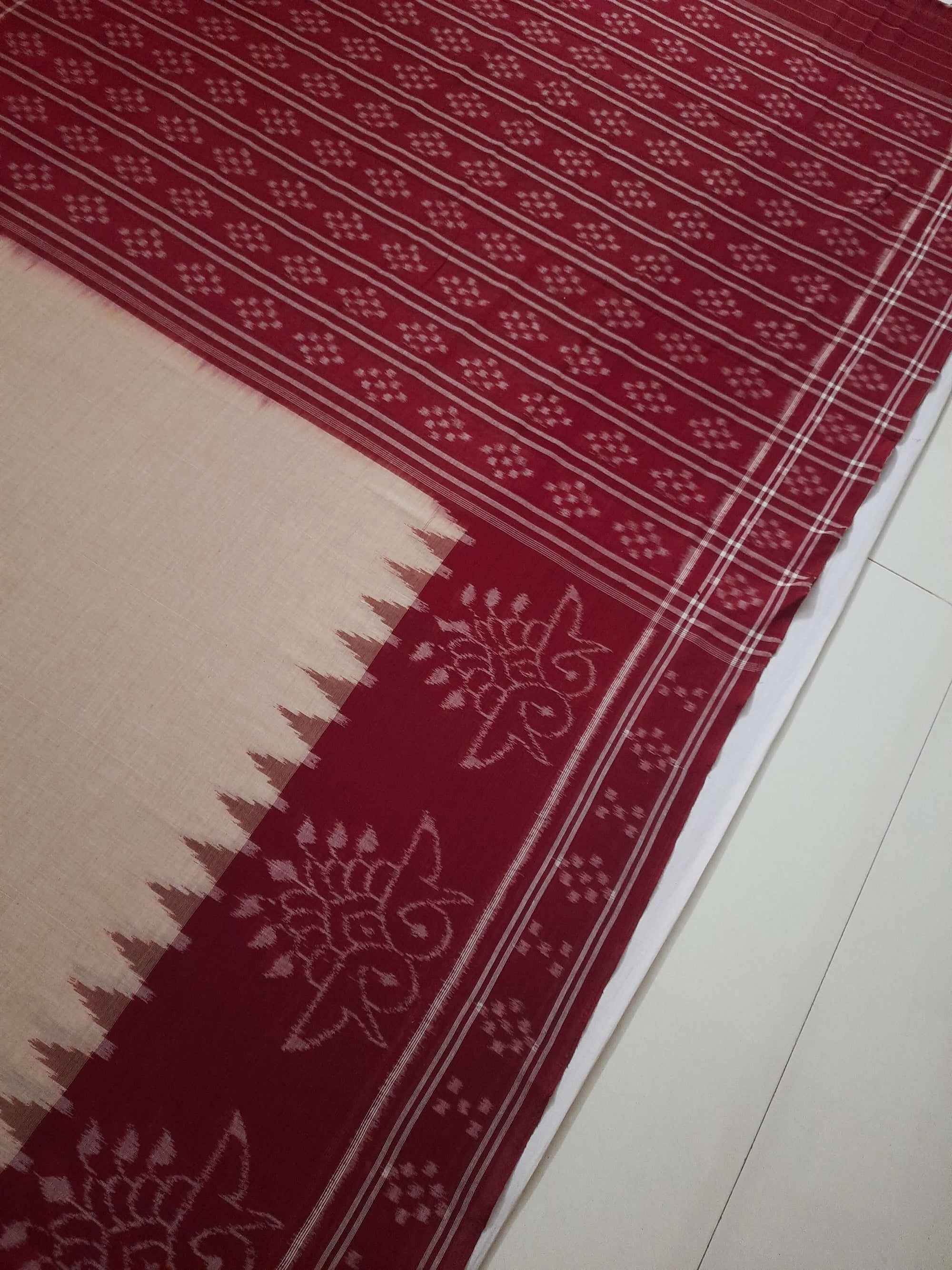 Beige and Maroon wide border Cotton Odisha Ikat saree with cotton ikat blouse piece