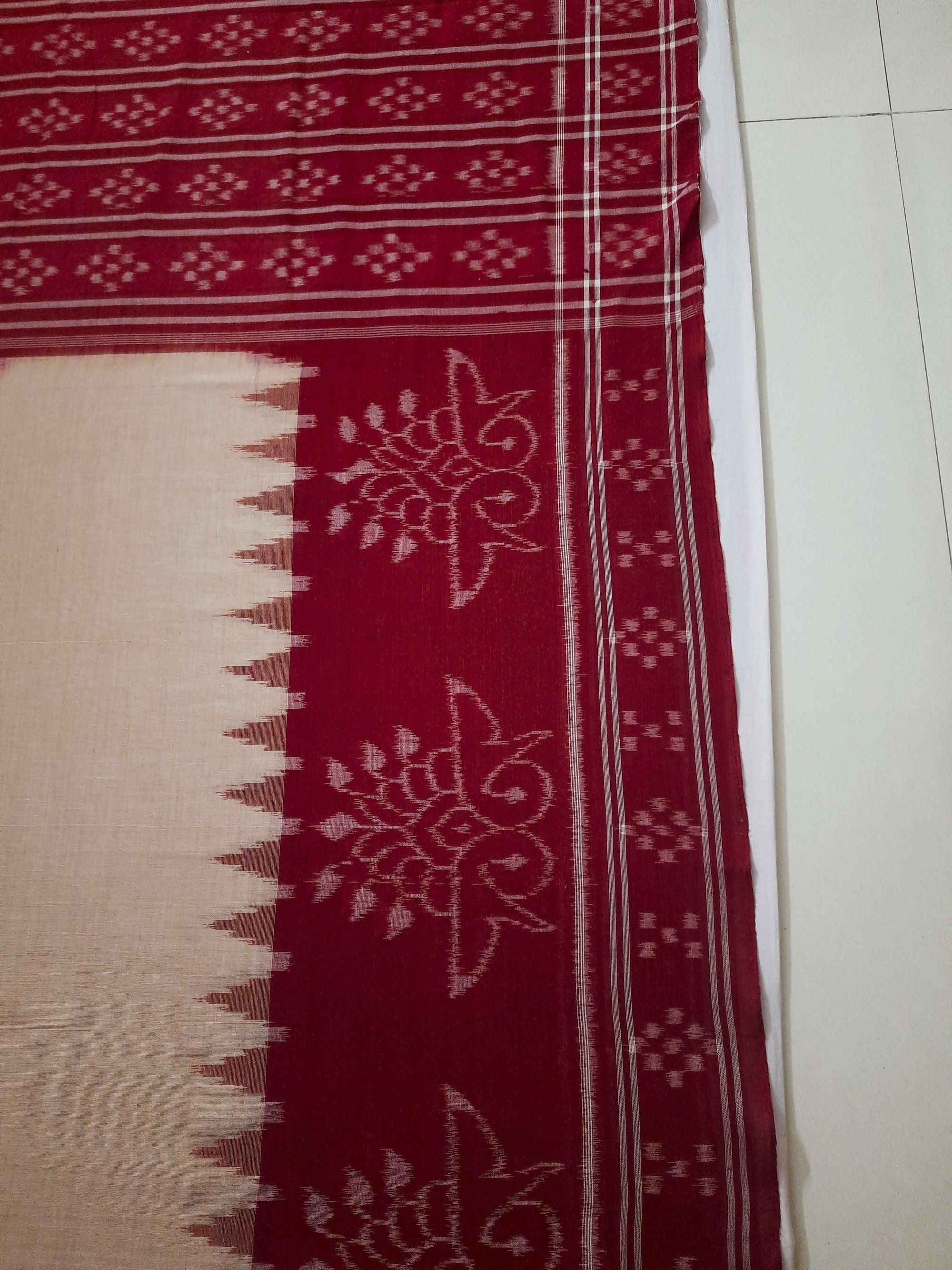 Beige and Maroon wide border Cotton Odisha Ikat saree with cotton ikat blouse piece