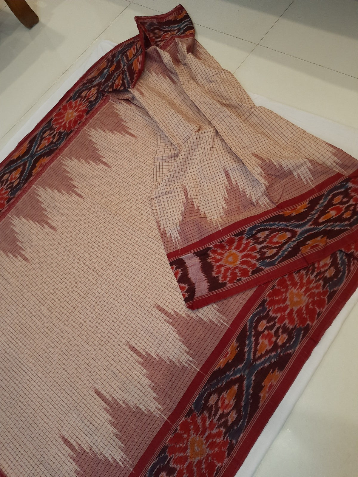 Beige checkered body Cotton Odisha Ikat saree with mix match cotton ikat blouse