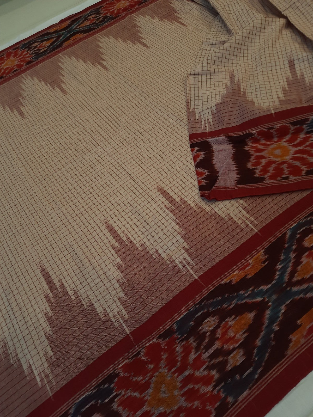Beige checkered body Cotton Odisha Ikat saree with mix match cotton ikat blouse