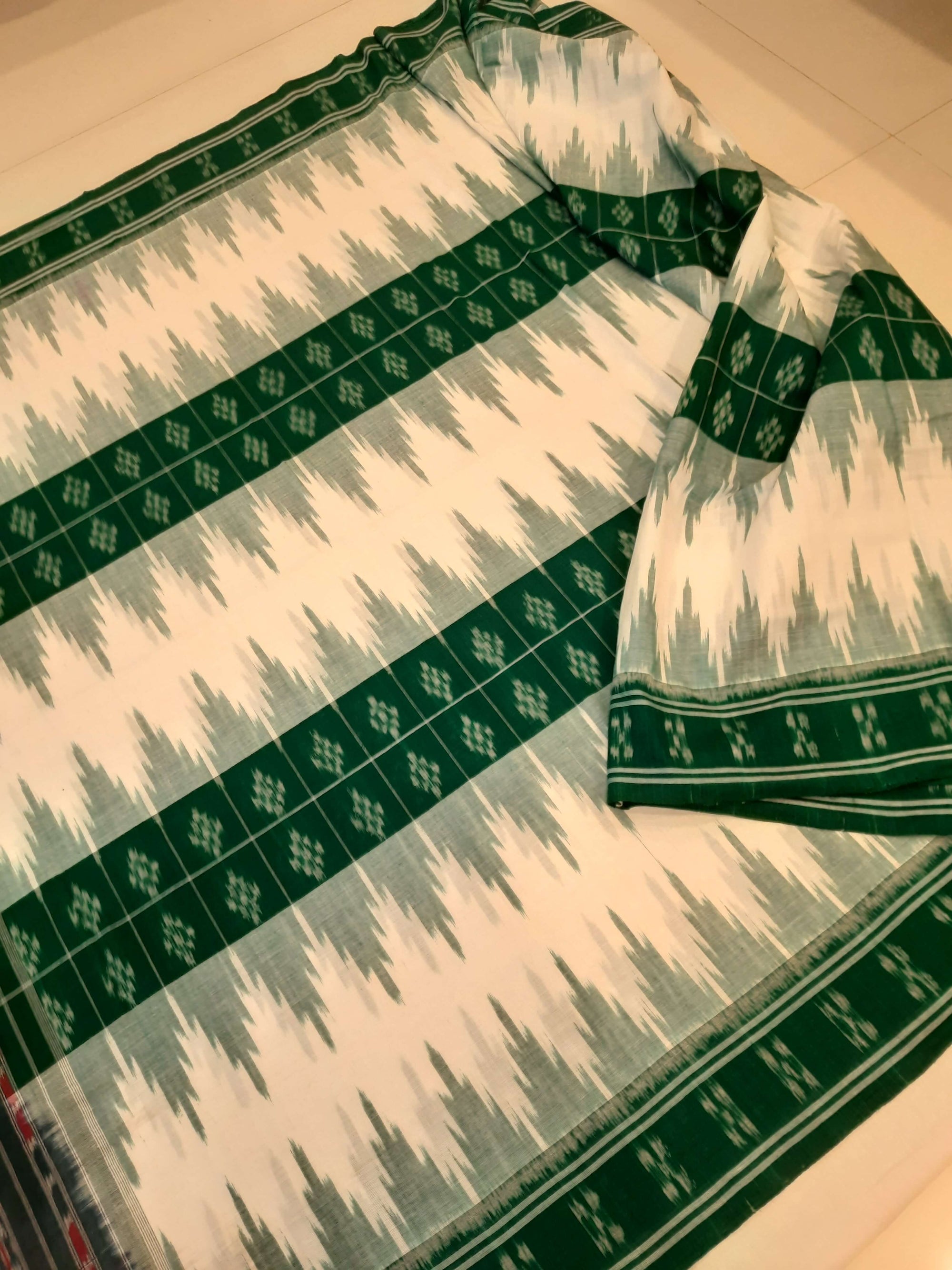 White and Green Cotton Odisha Ikat saree with mix match blouse piece