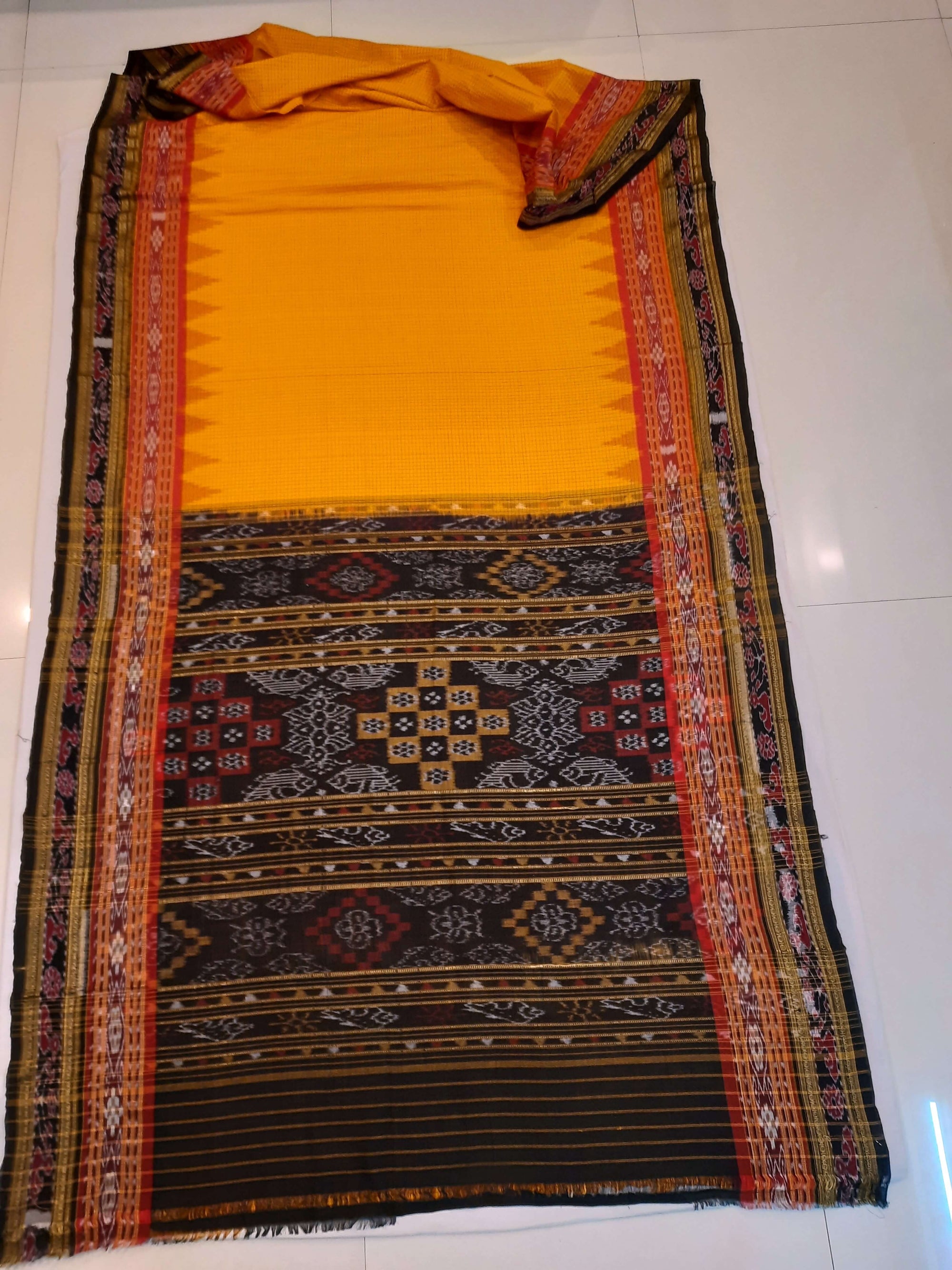 Yellow double order Sachipar Nuapatna Cotton Ikat saree with cotton ikat blouse piece