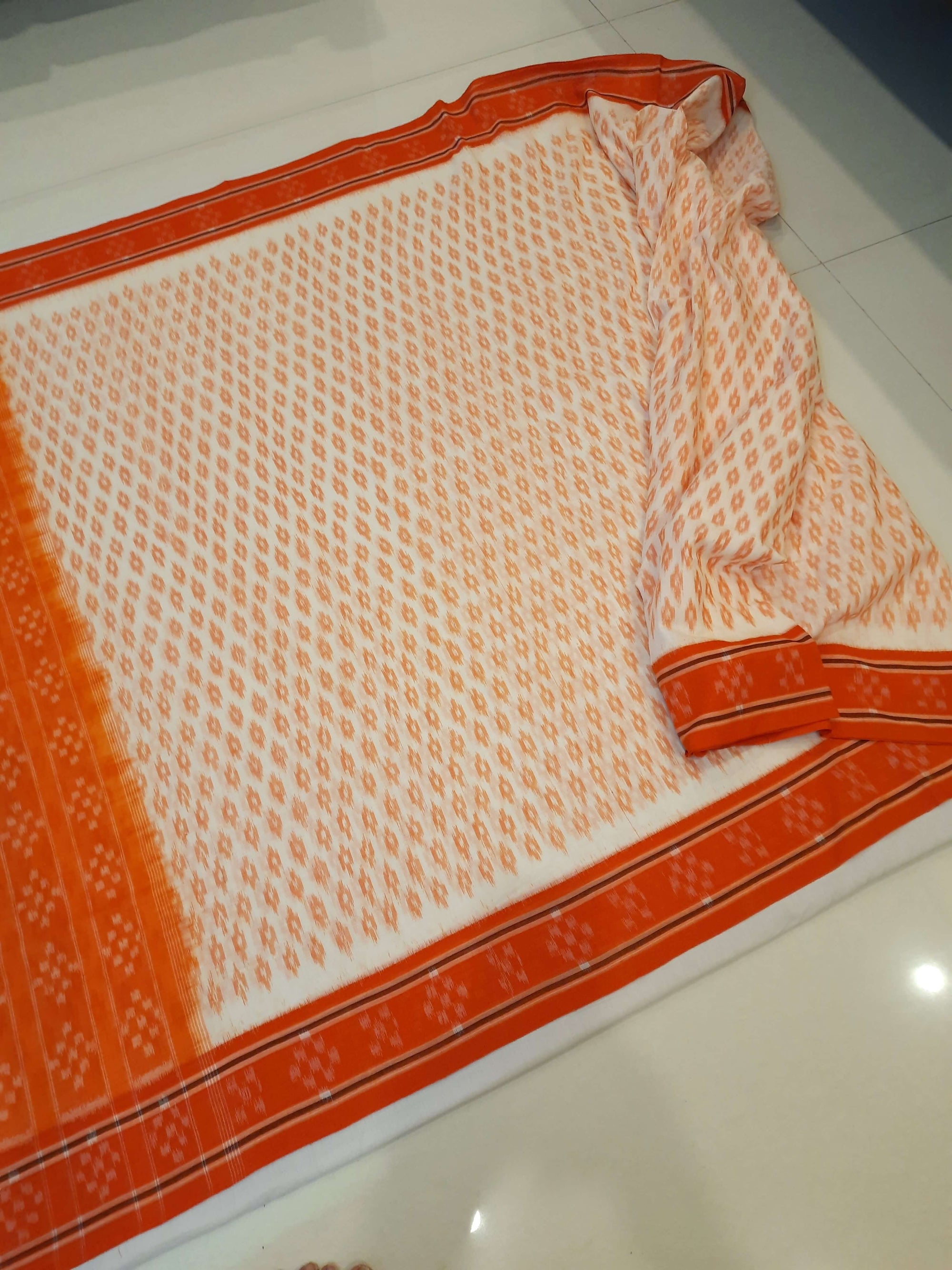 White with Orange cotton Odisha Ikat Saree with mix match cotton Ikat blouse piece