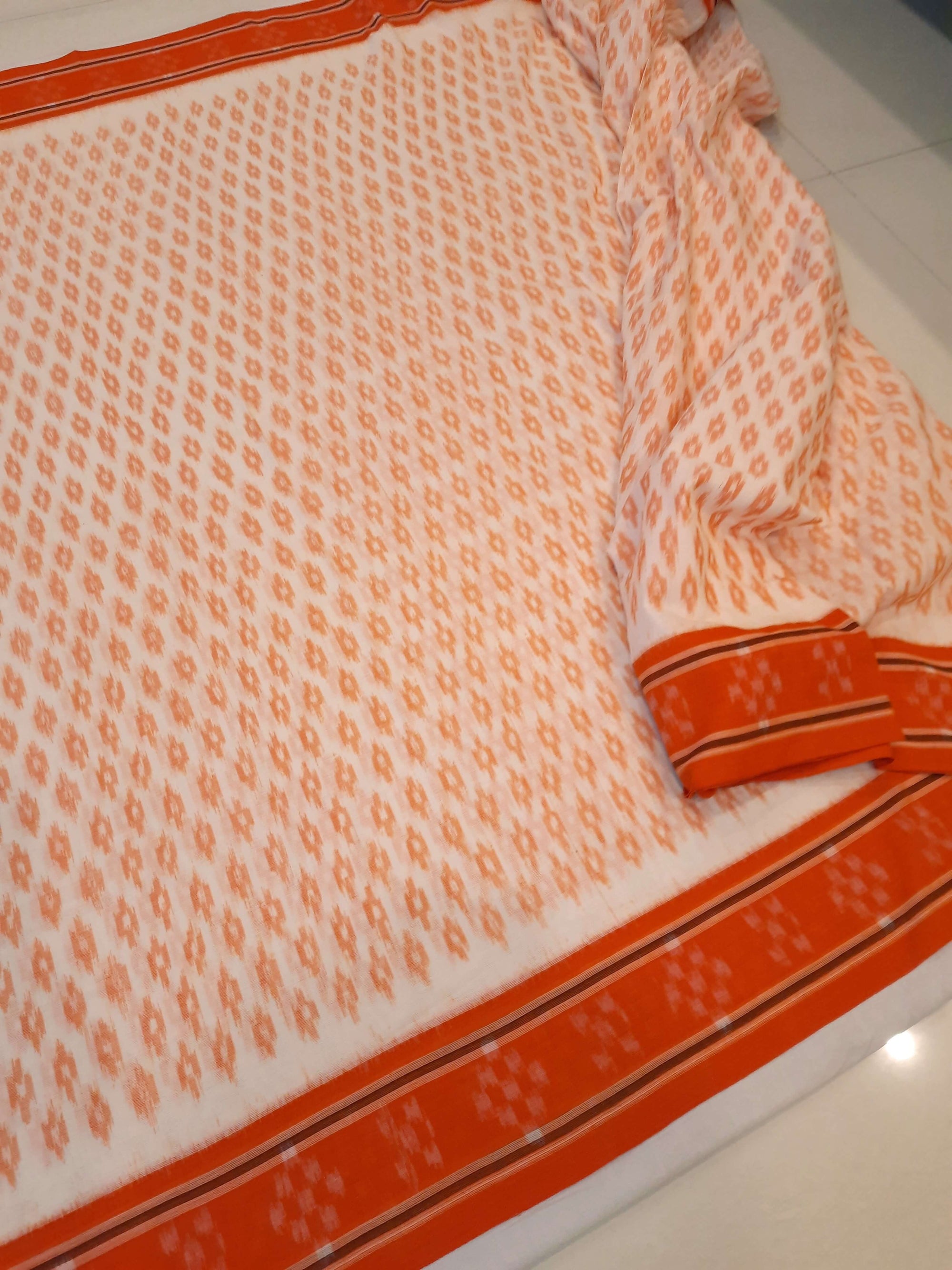 White with Orange cotton Odisha Ikat Saree with mix match cotton Ikat blouse piece