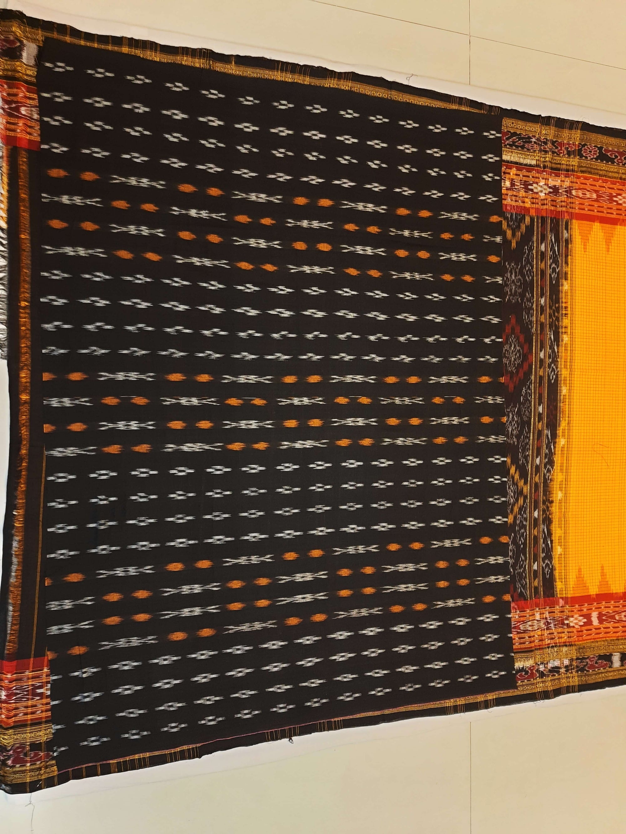 Yellow double order Sachipar Nuapatna Cotton Ikat saree with cotton ikat blouse piece