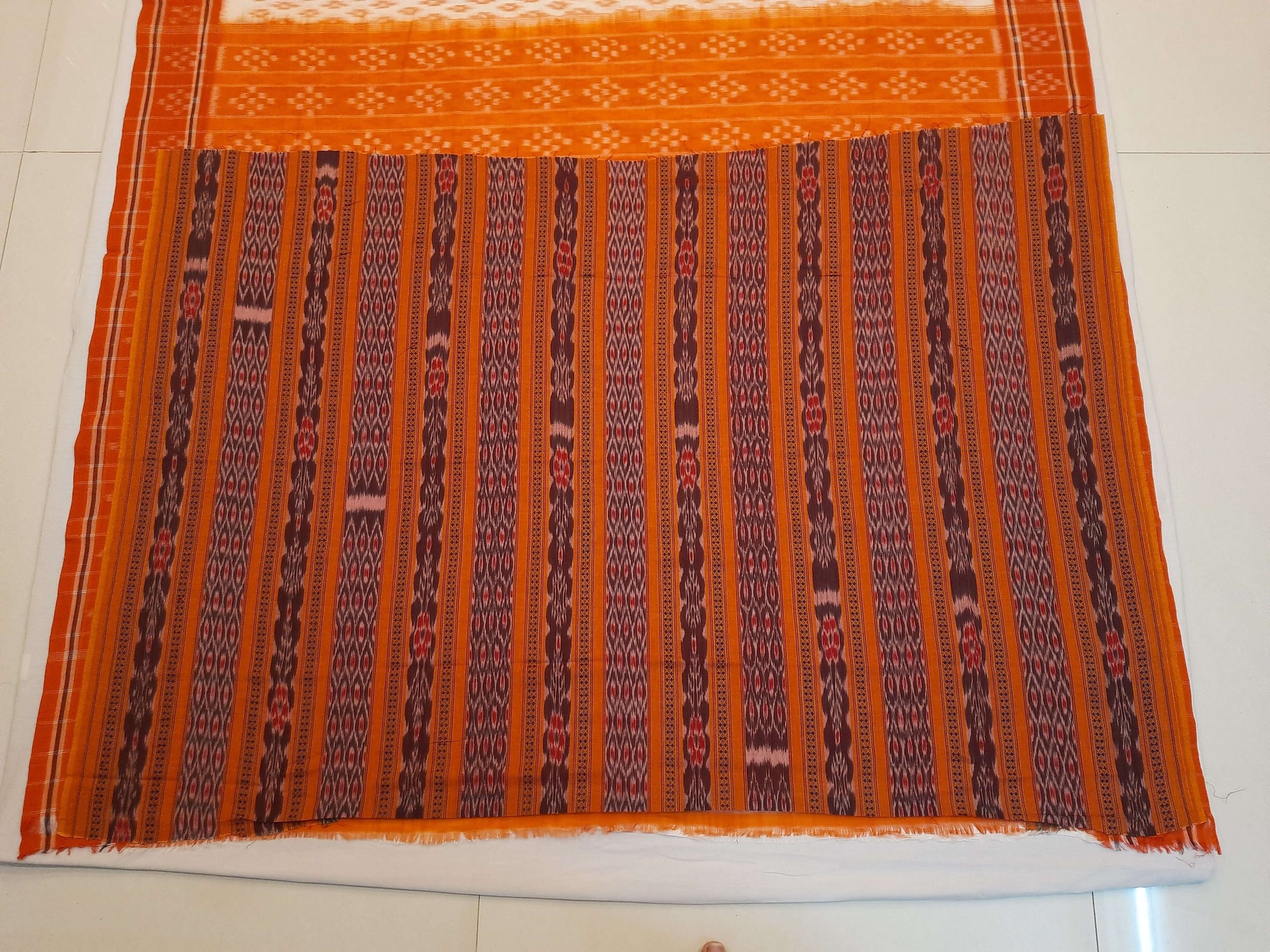 White with Orange cotton Odisha Ikat Saree with mix match cotton Ikat blouse piece