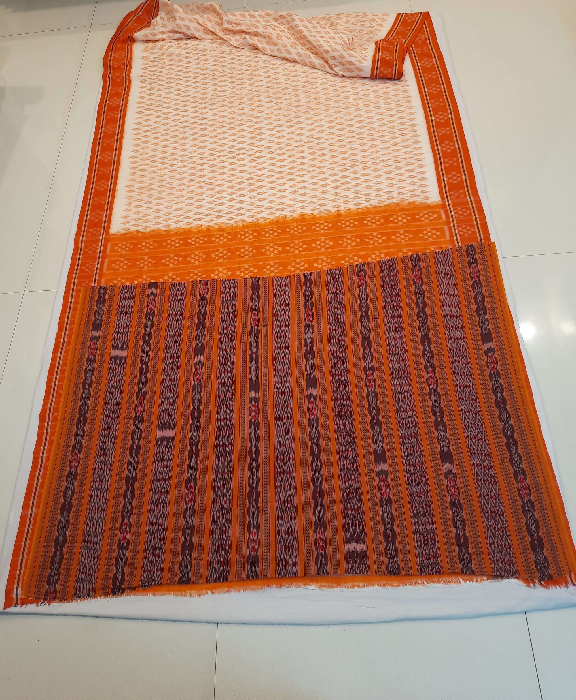 White with Orange cotton Odisha Ikat Saree with mix match cotton Ikat blouse piece
