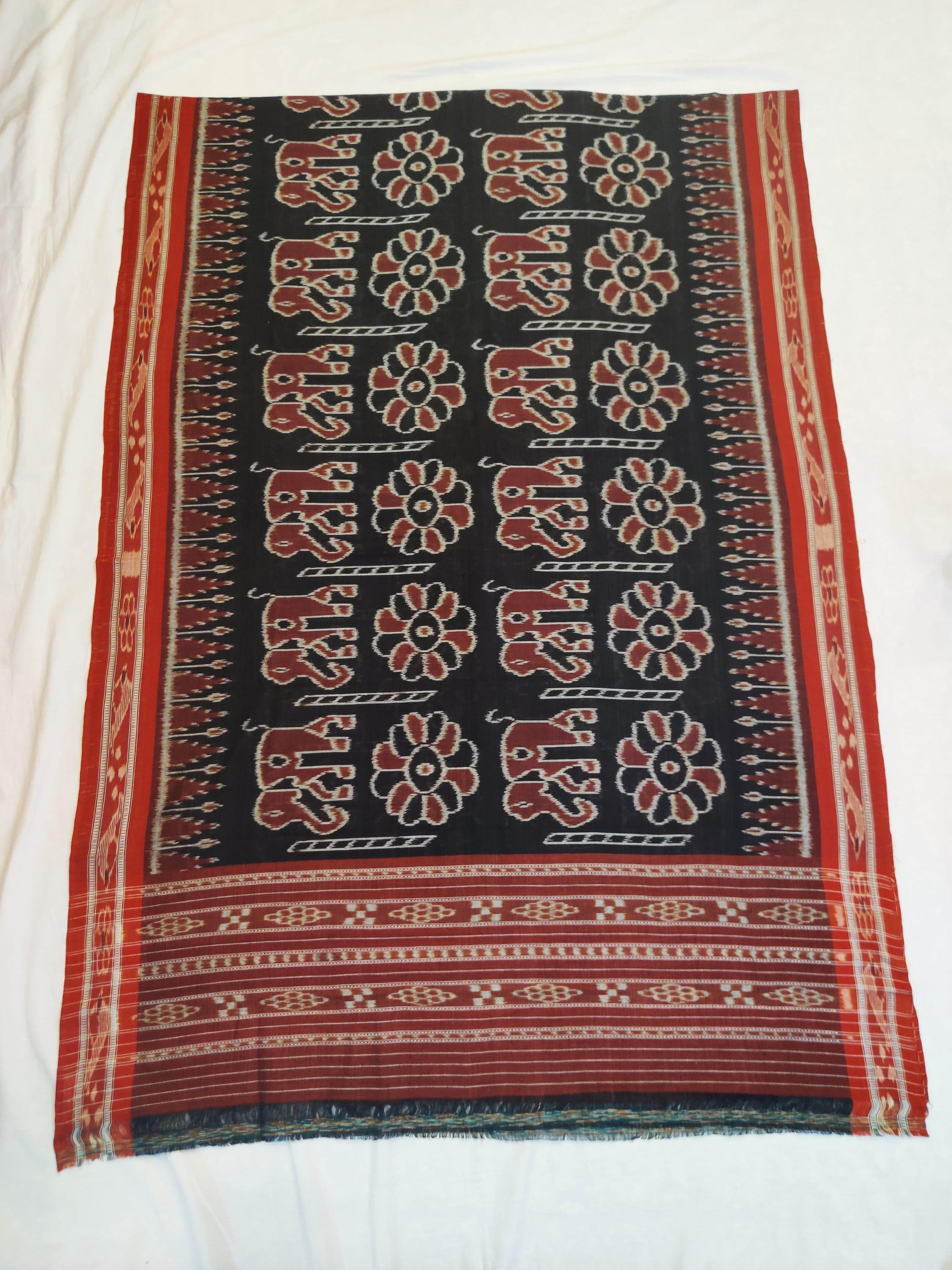 Black Cotton ikat Dupatta with elephant and flower motifs woven