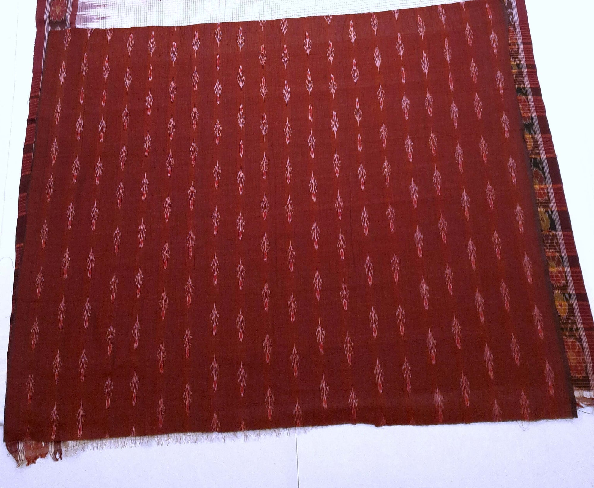 Beige checkered body Tussar Silk Odisha Ikat Saree with cotton ikat blouse piece