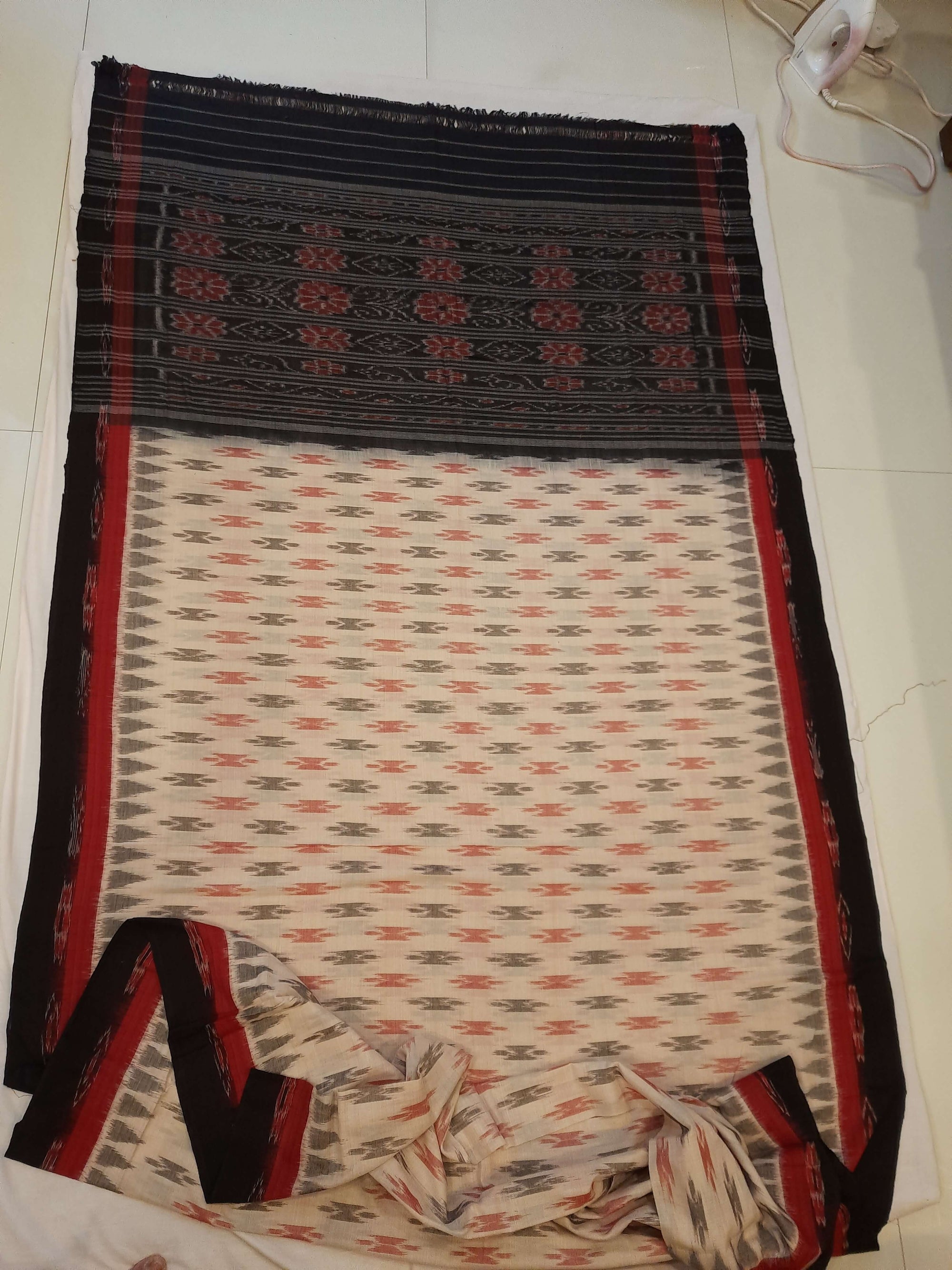 Beige with double border Cotton Odisha Ikat saree with cotton ikat blouse piece