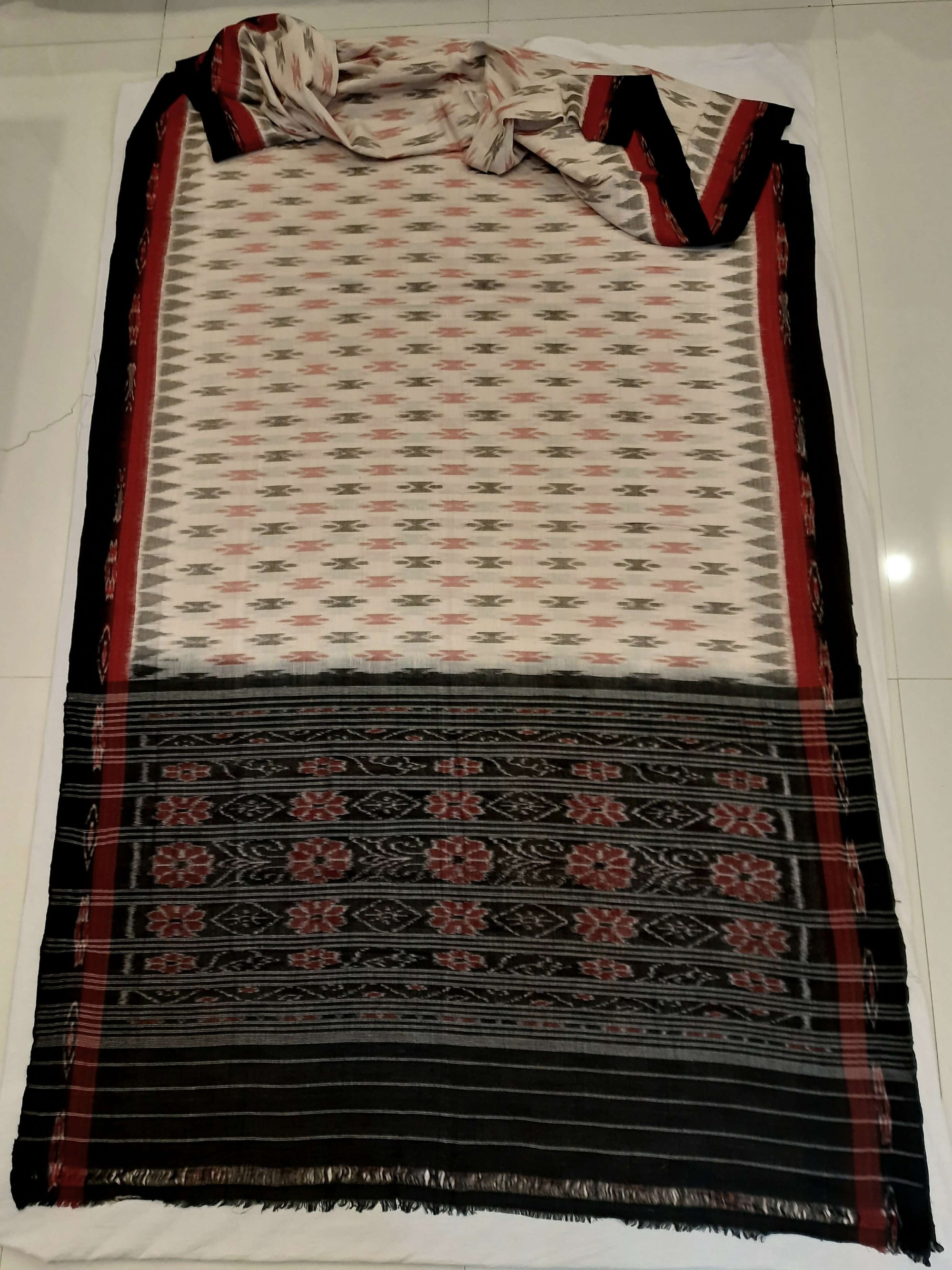 Beige with double border Cotton Odisha Ikat saree with cotton ikat blouse piece