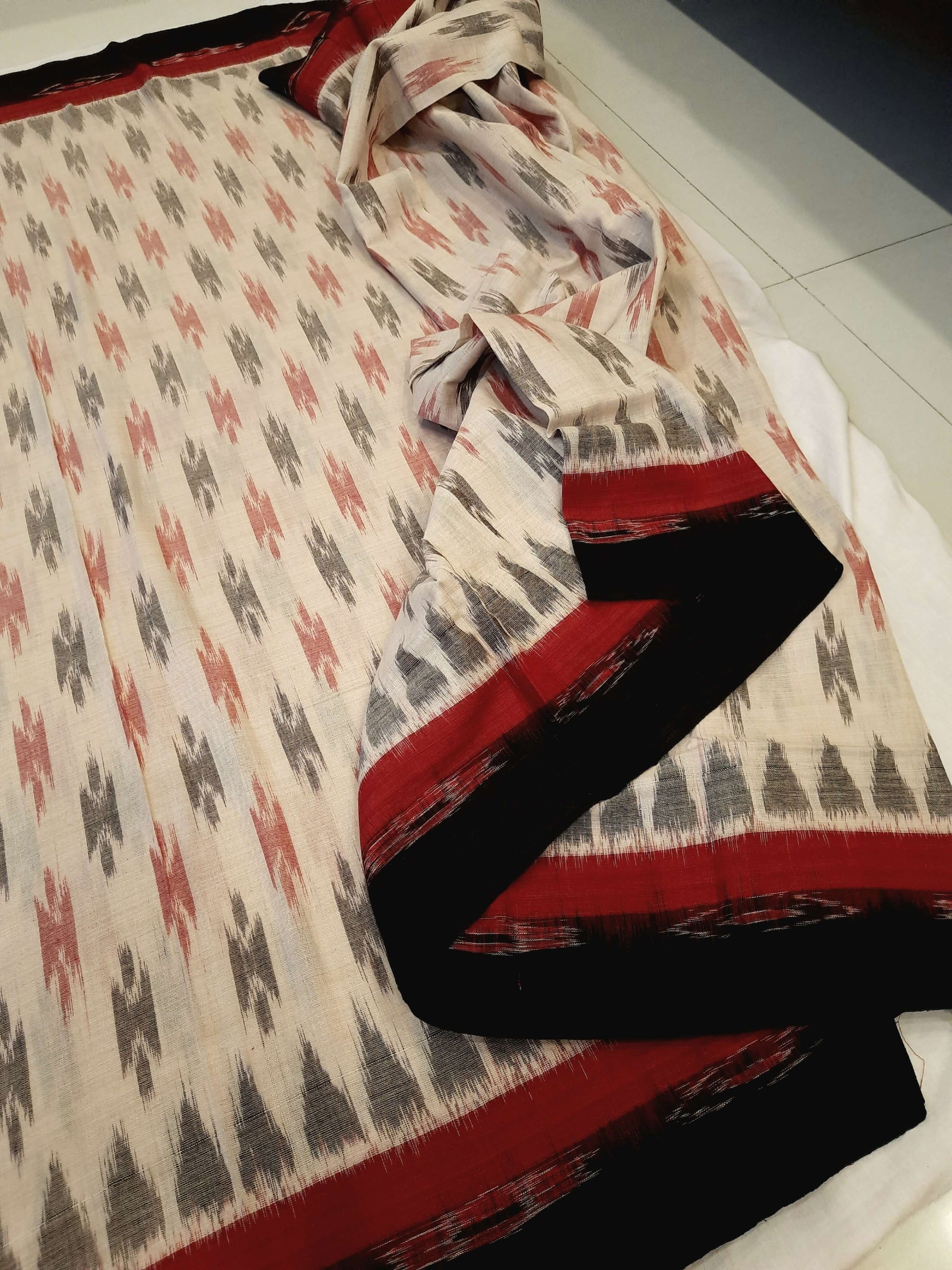 Beige with double border Cotton Odisha Ikat saree with cotton ikat blouse piece