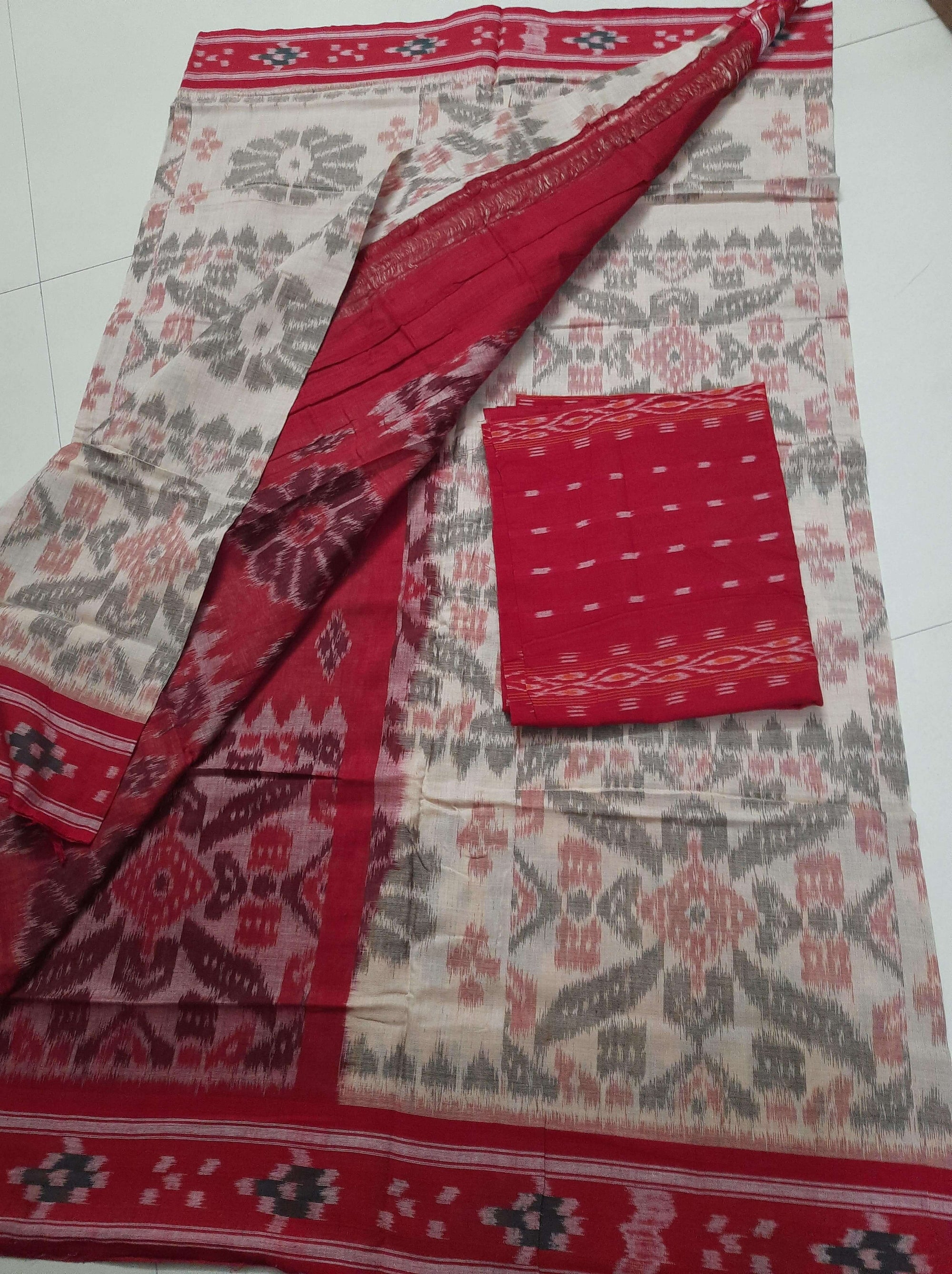 Beige and Red coloured Odisha Ikat saree  with cotton ikat blouse piece