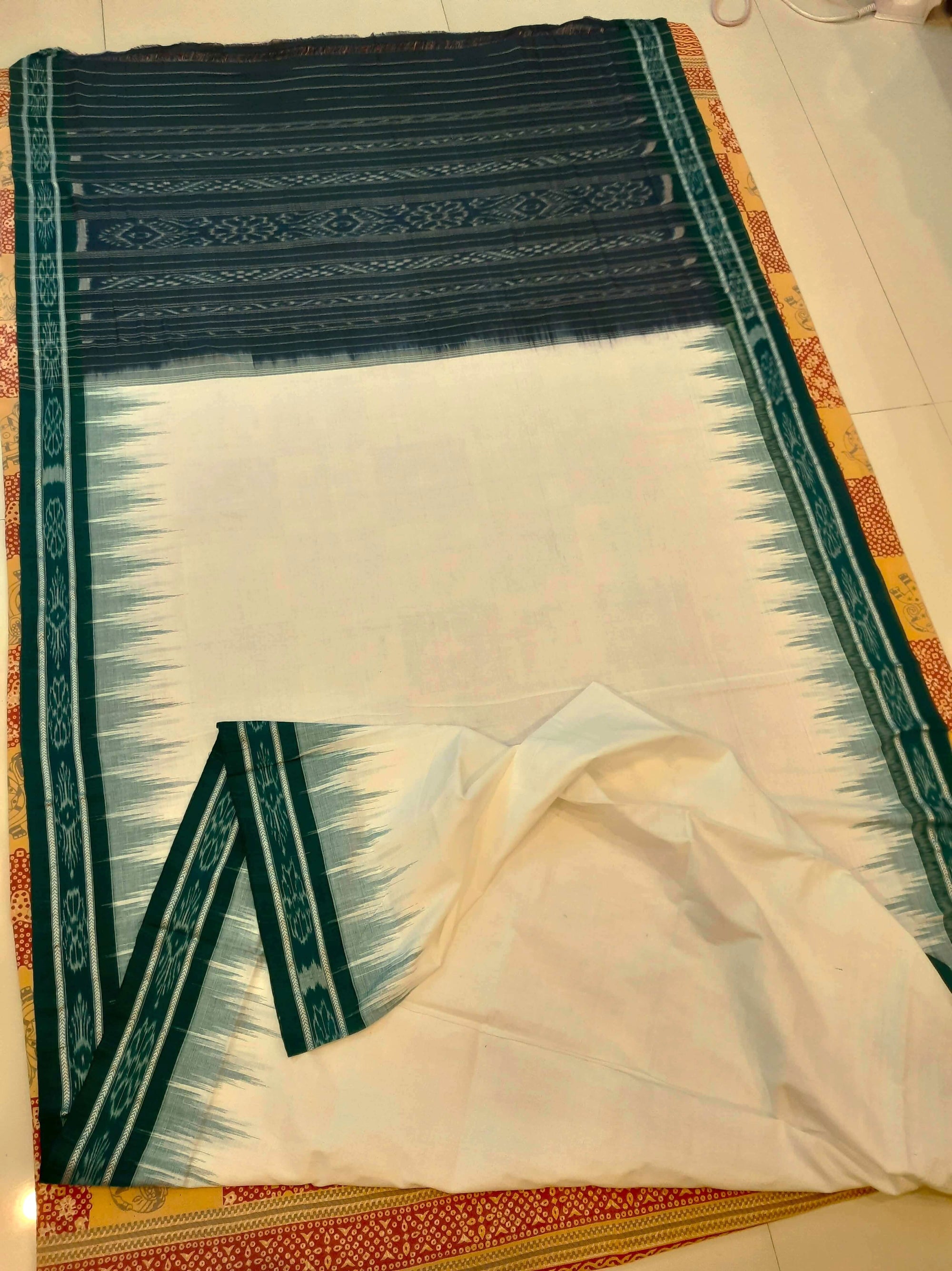 White and Green Odisha Ikat saree with cotton ikat blouse piece