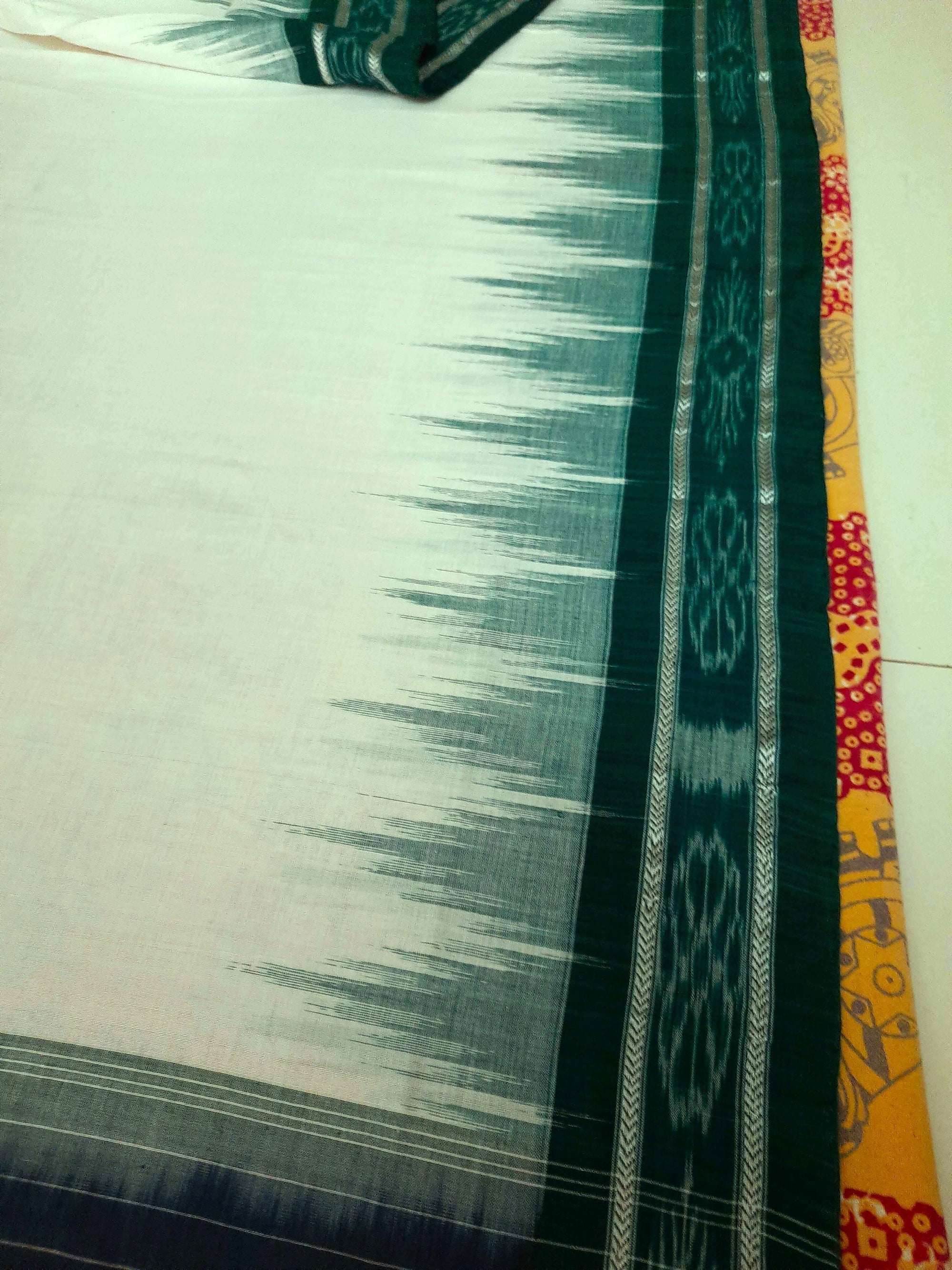 White and Green Odisha Ikat saree with cotton ikat blouse piece