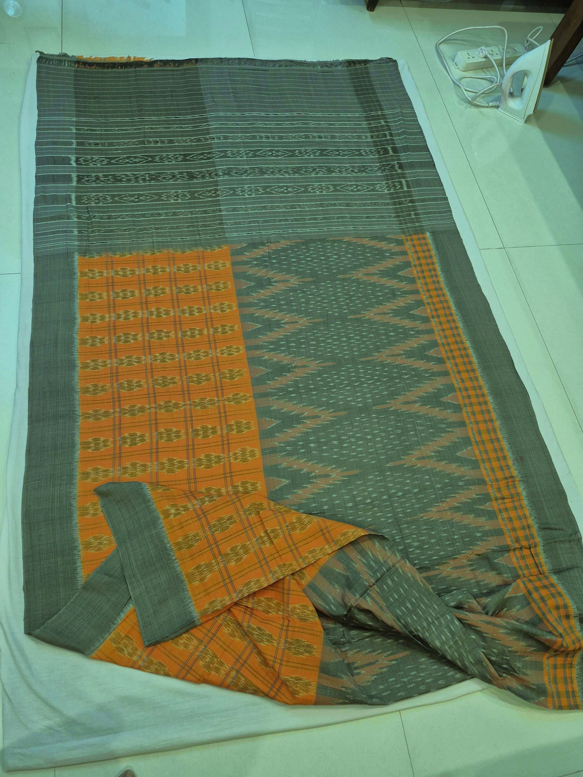 Light Green Orange half half body coloured Odisha Ikat saree with cotton ikat blouse piece