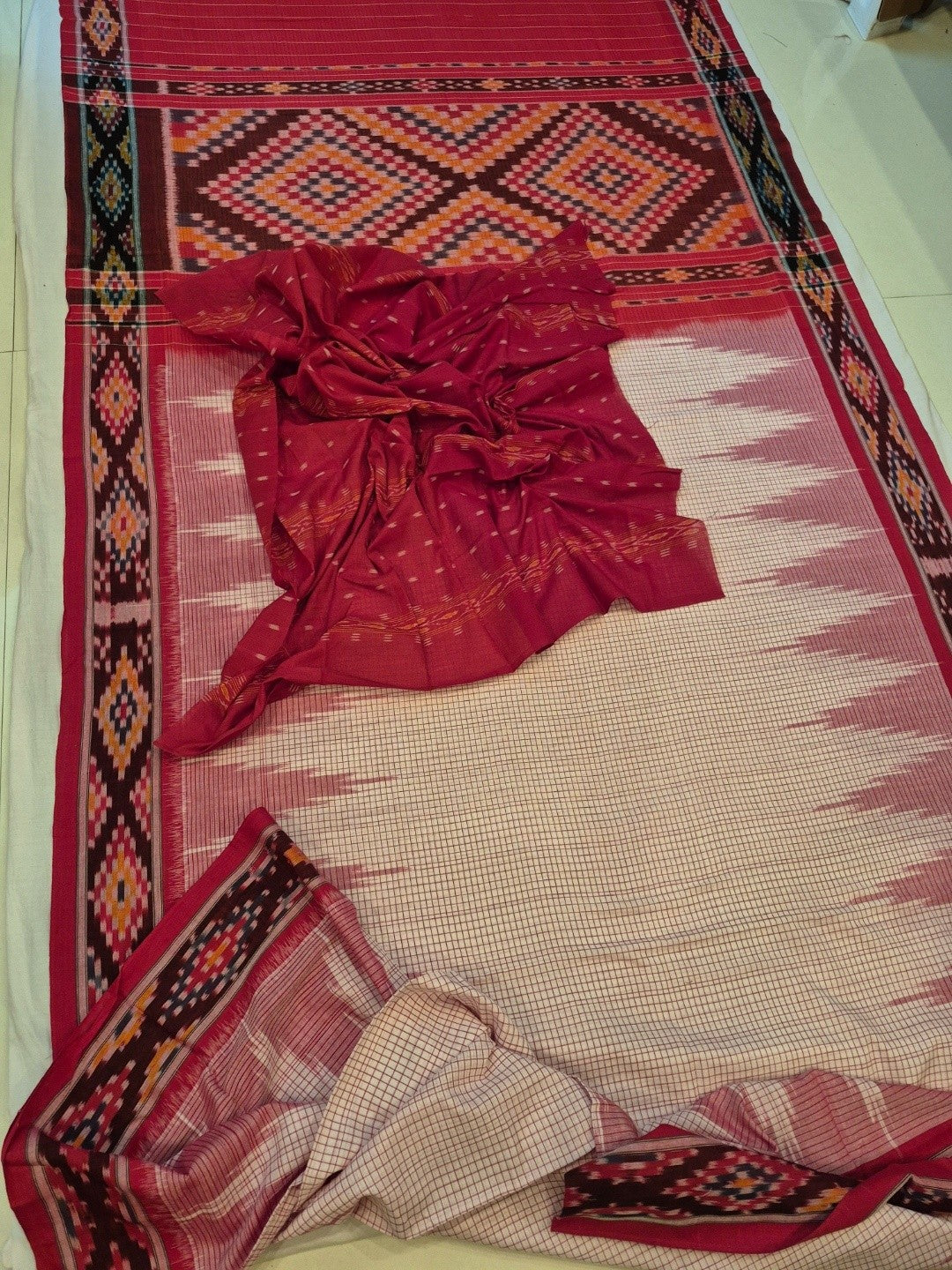 Beige Checkered body Cotton Odisha Ikat saree with cotton ikat blouse piece